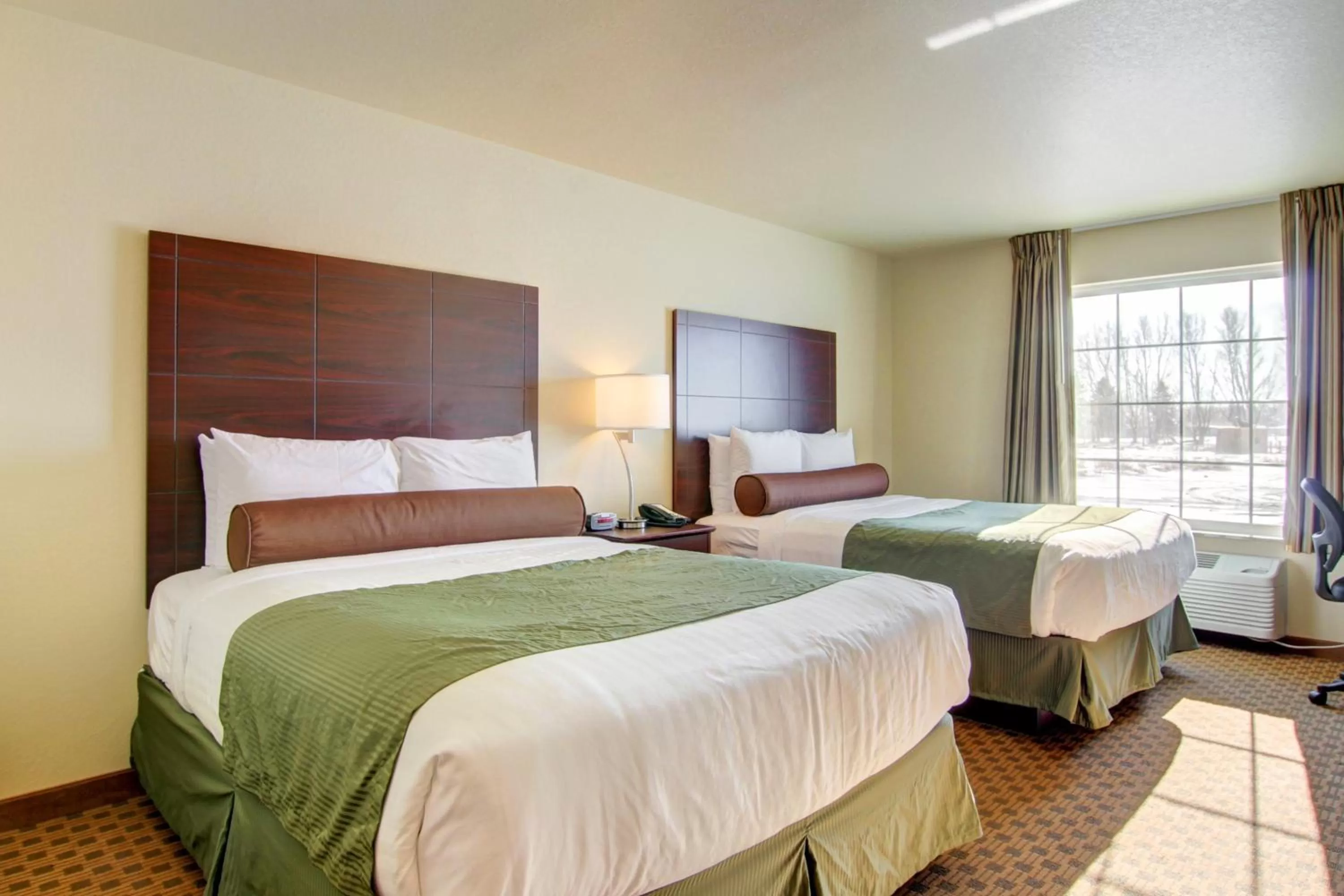 Bed in Cobblestone Hotel & Suites - Waynesboro