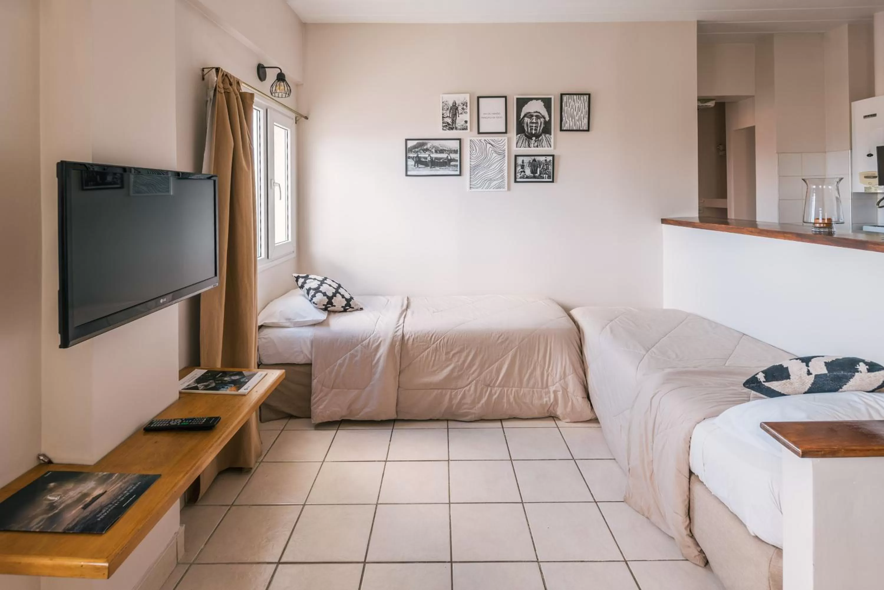 Communal lounge/ TV room, Bed in Riviera Fueguina Apartments