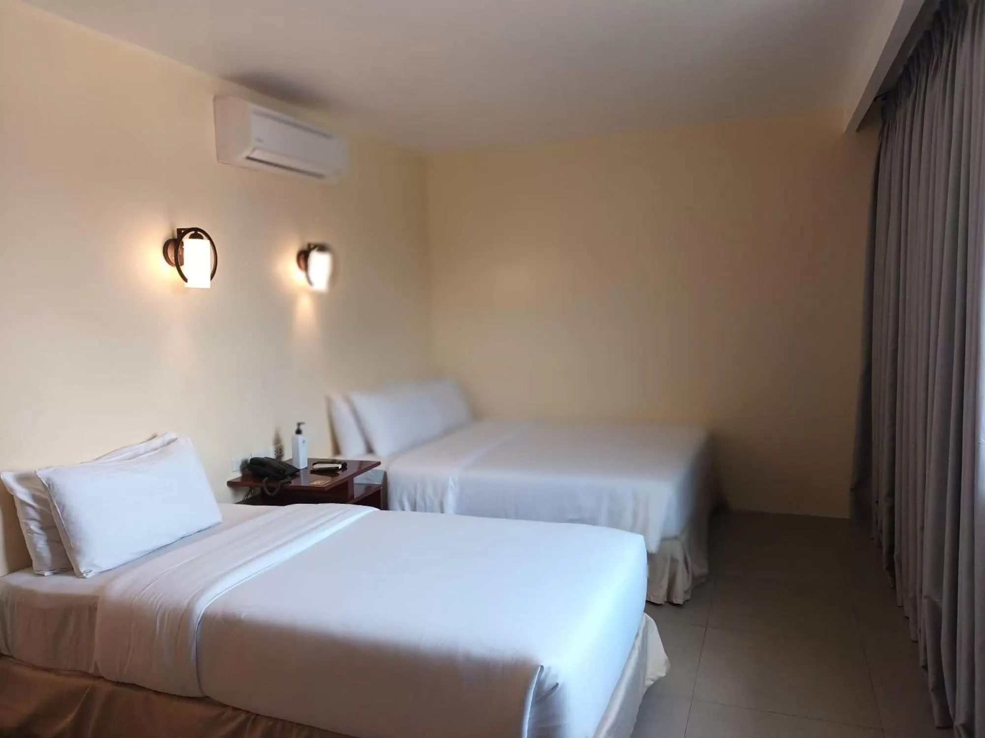 Bed in Dosi Hotel PH