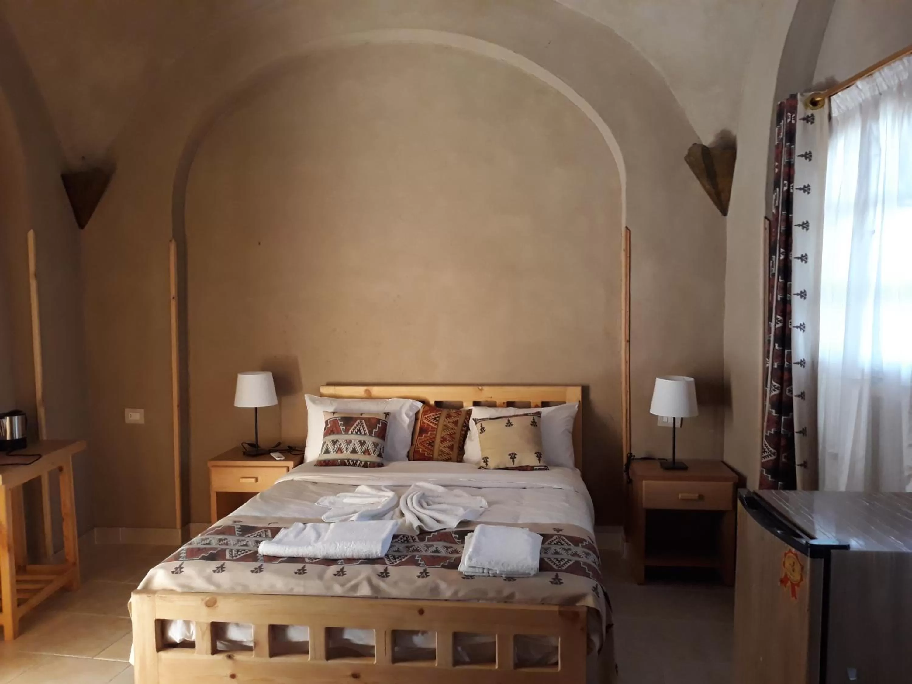 Bed in Embrace Hotel