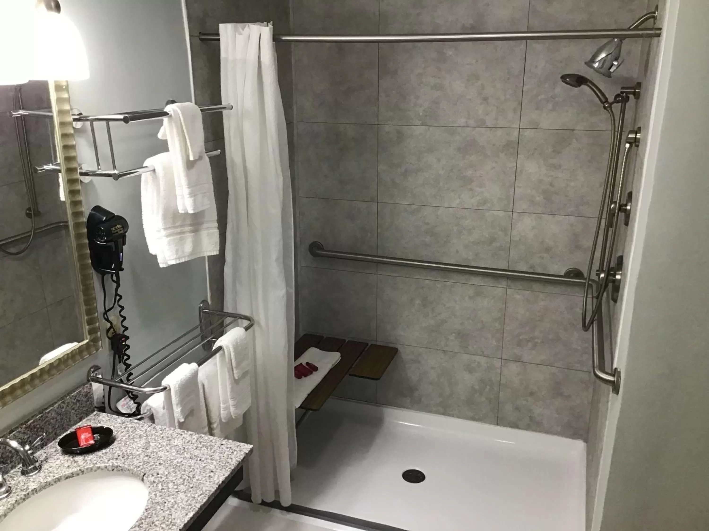 Suite with Mobility Accessible Roll-In Shower in SureStay Studio by Best Western Pensacola