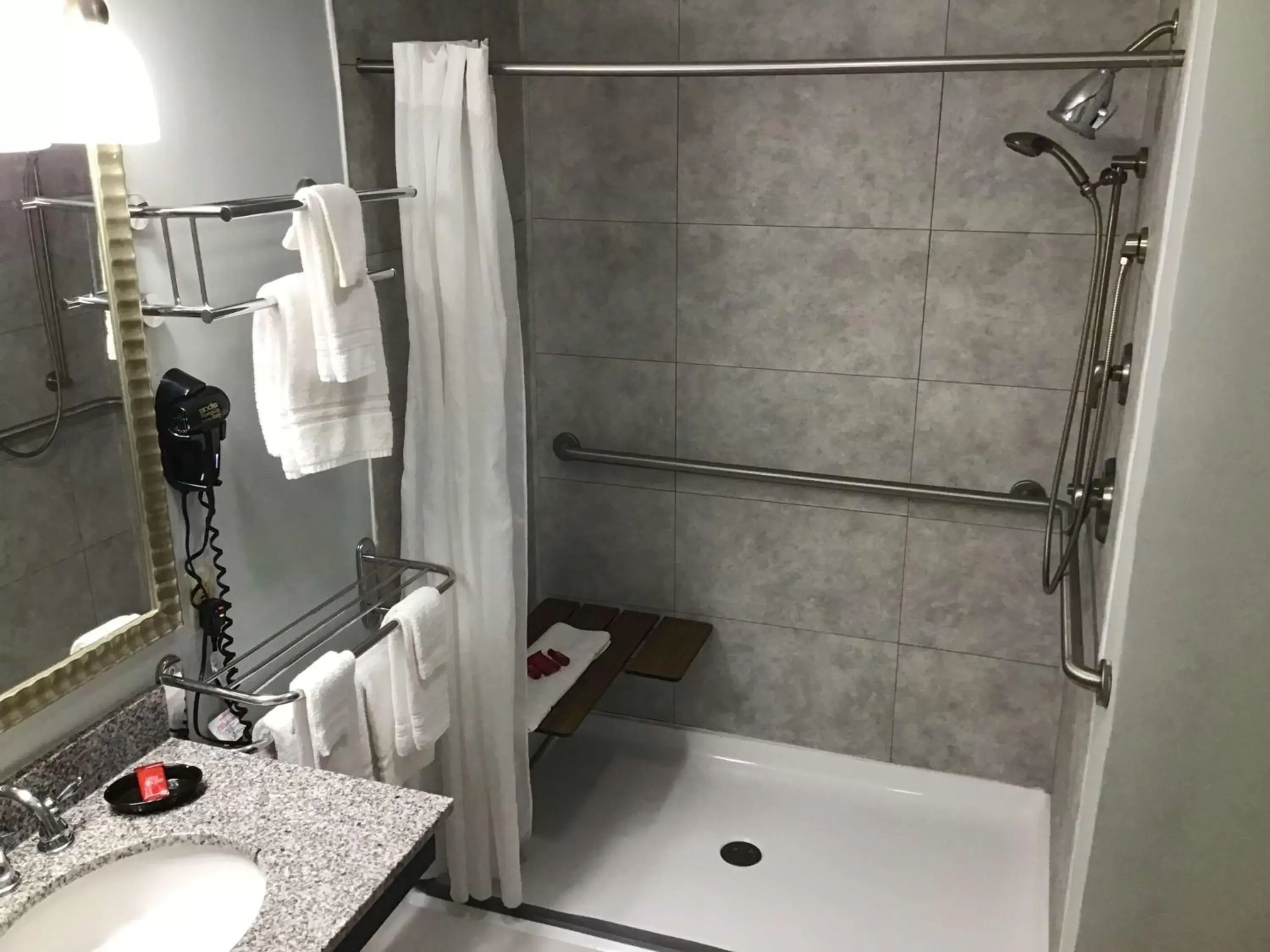Suite with Mobility Accessible Roll-In Shower in SureStay Studio by Best Western Pensacola Suite with Mobility Accessible Roll-In Shower in SureStay Studio by Best Western Pensacola