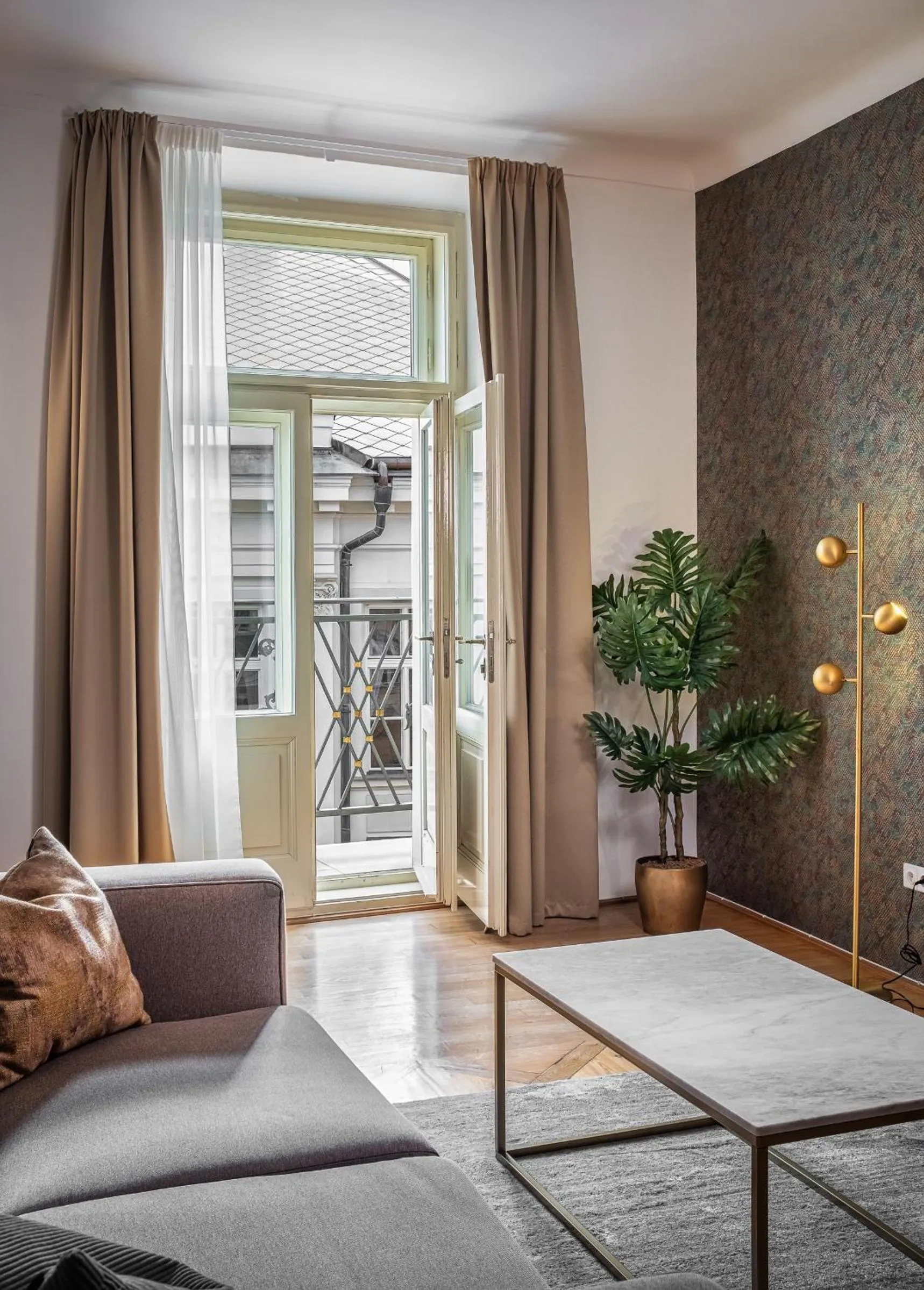 Seating area, Bed in Golden Angel Suites by Adrez