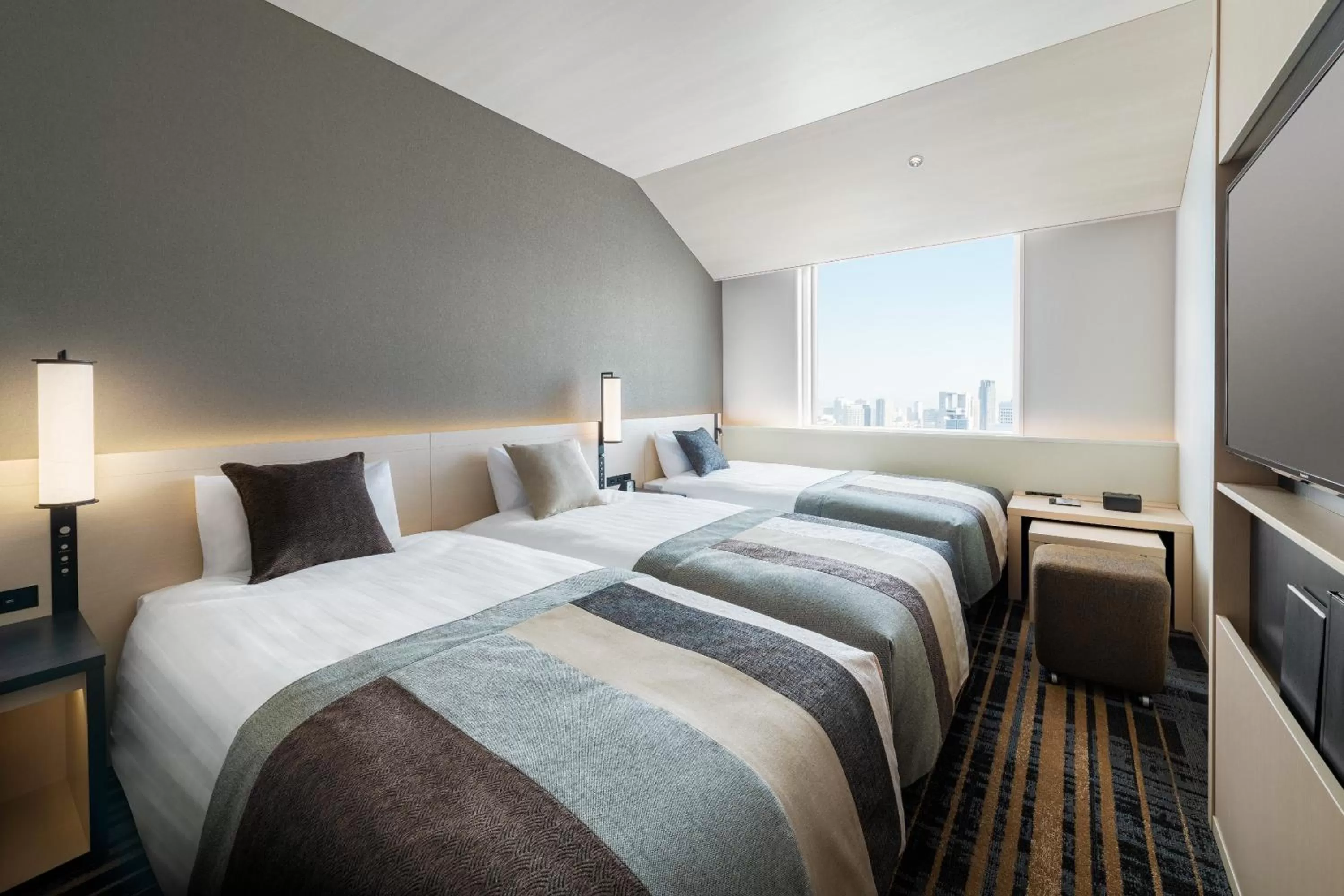 Photo of the whole room, Bed in Hotel Hankyu RESPIRE OSAKA