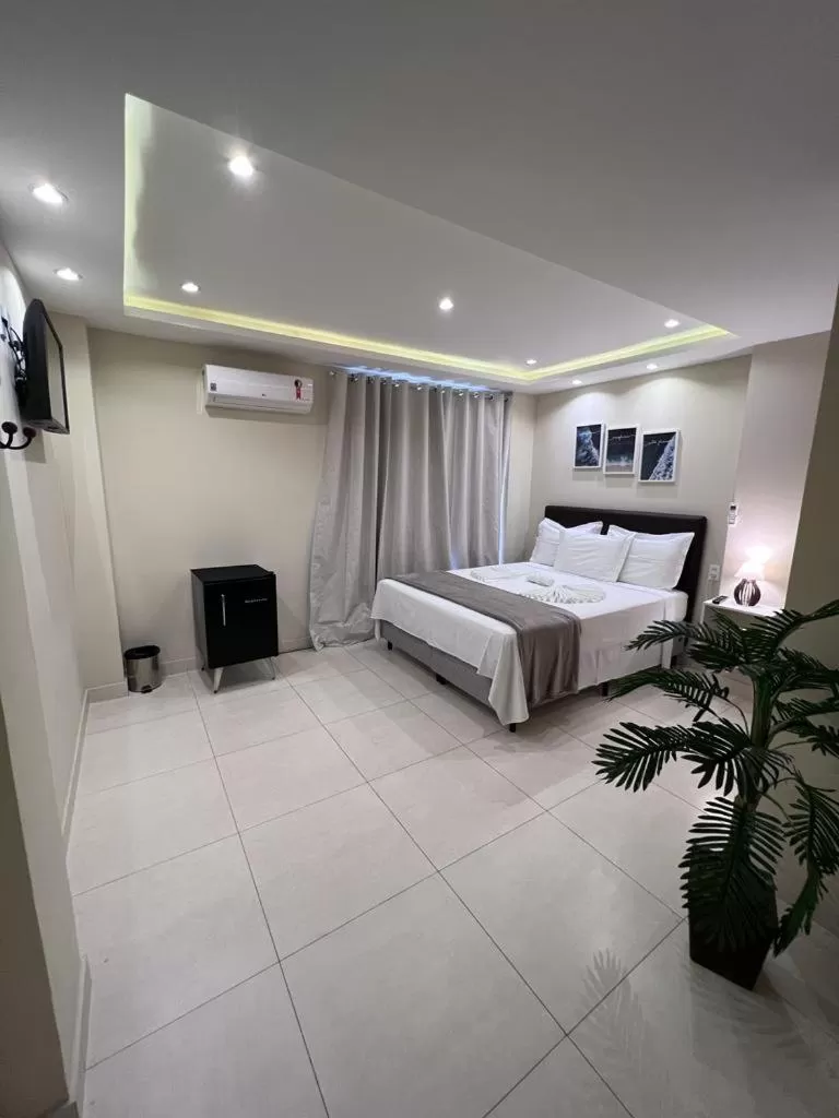 Bed in Pousada Arraial Tropical