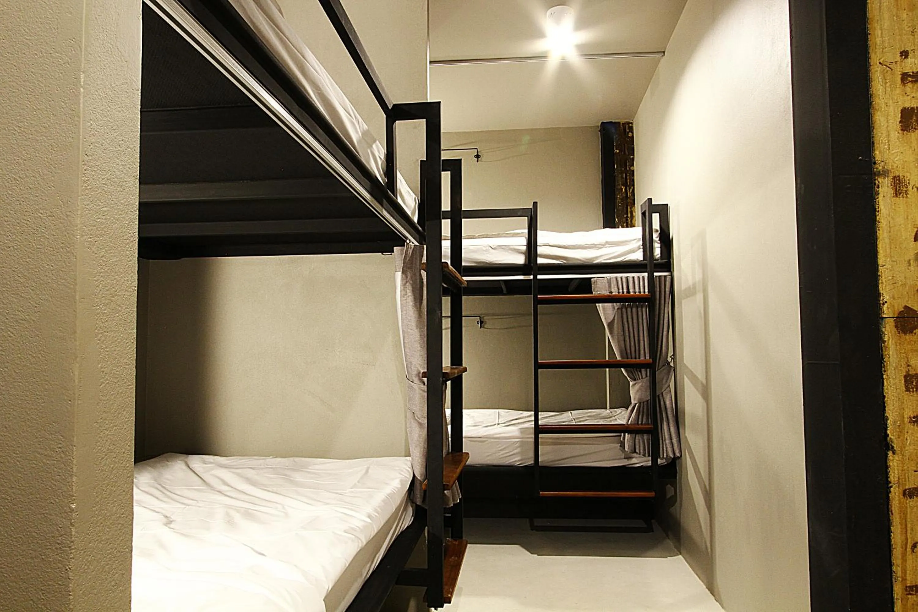 Photo of the whole room, Bed in Here Hostel Bangkok