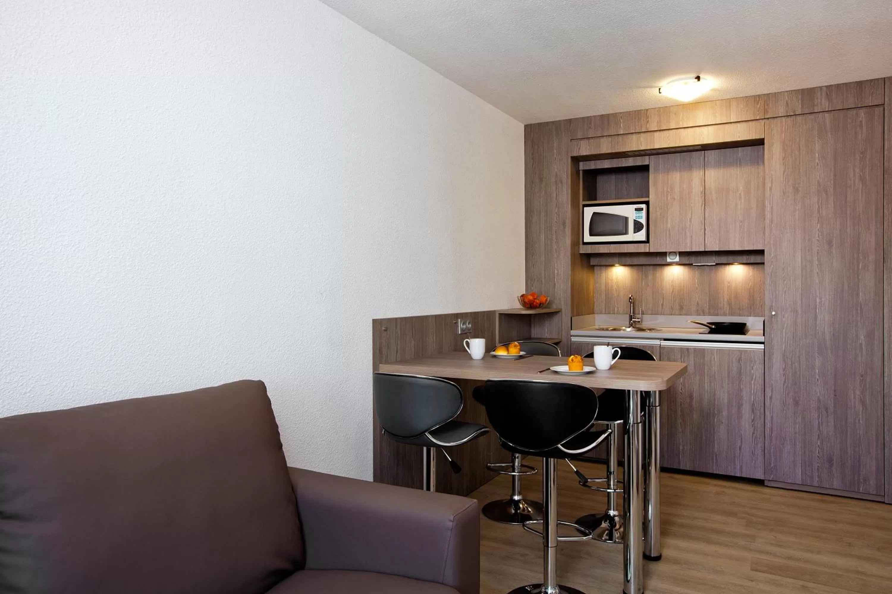 Kitchen or kitchenette in Séjours & Affaires Reims Clairmarais