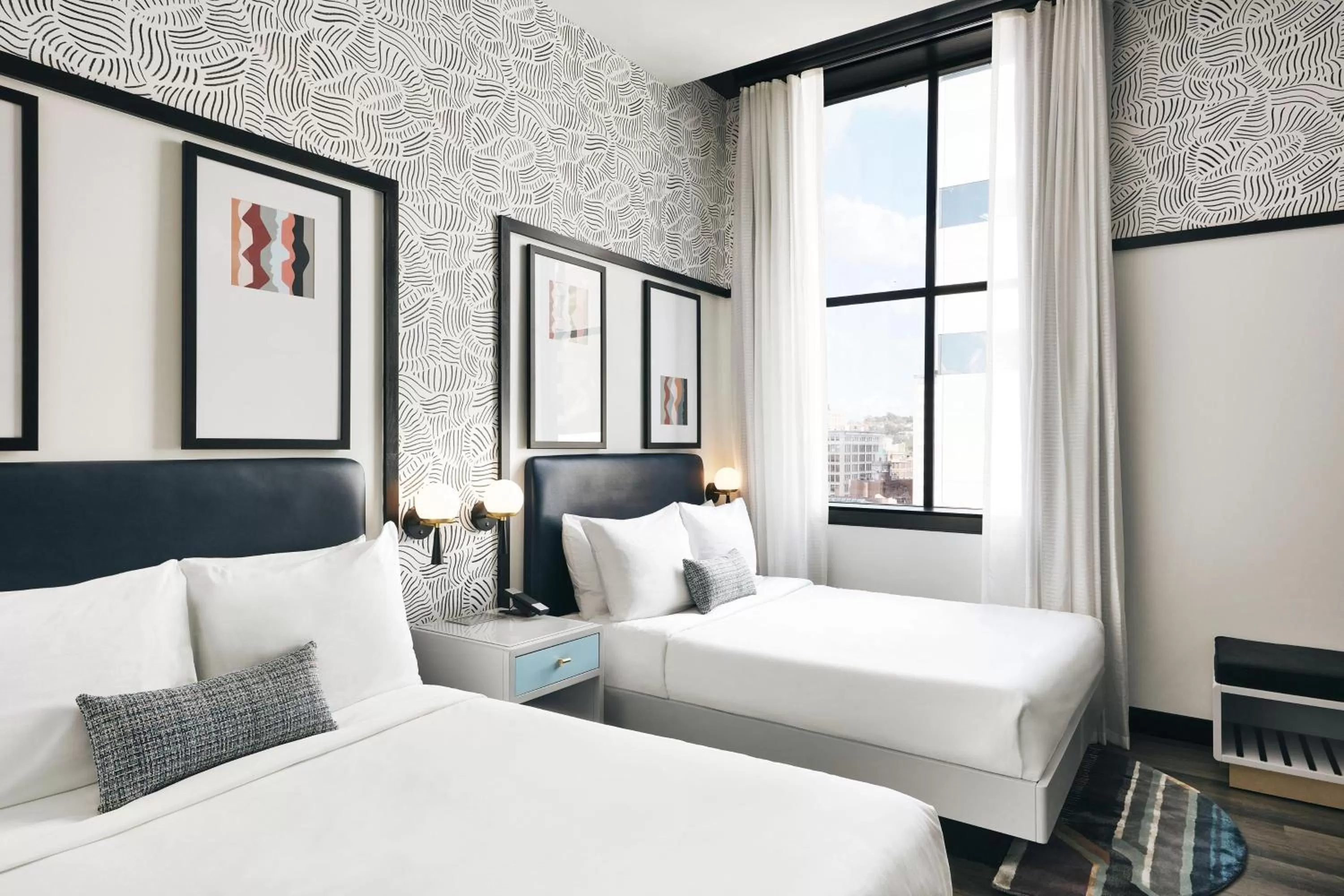 Photo of the whole room, Bed in Kinley Cincinnati Downtown, a Tribute Portfolio Hotel