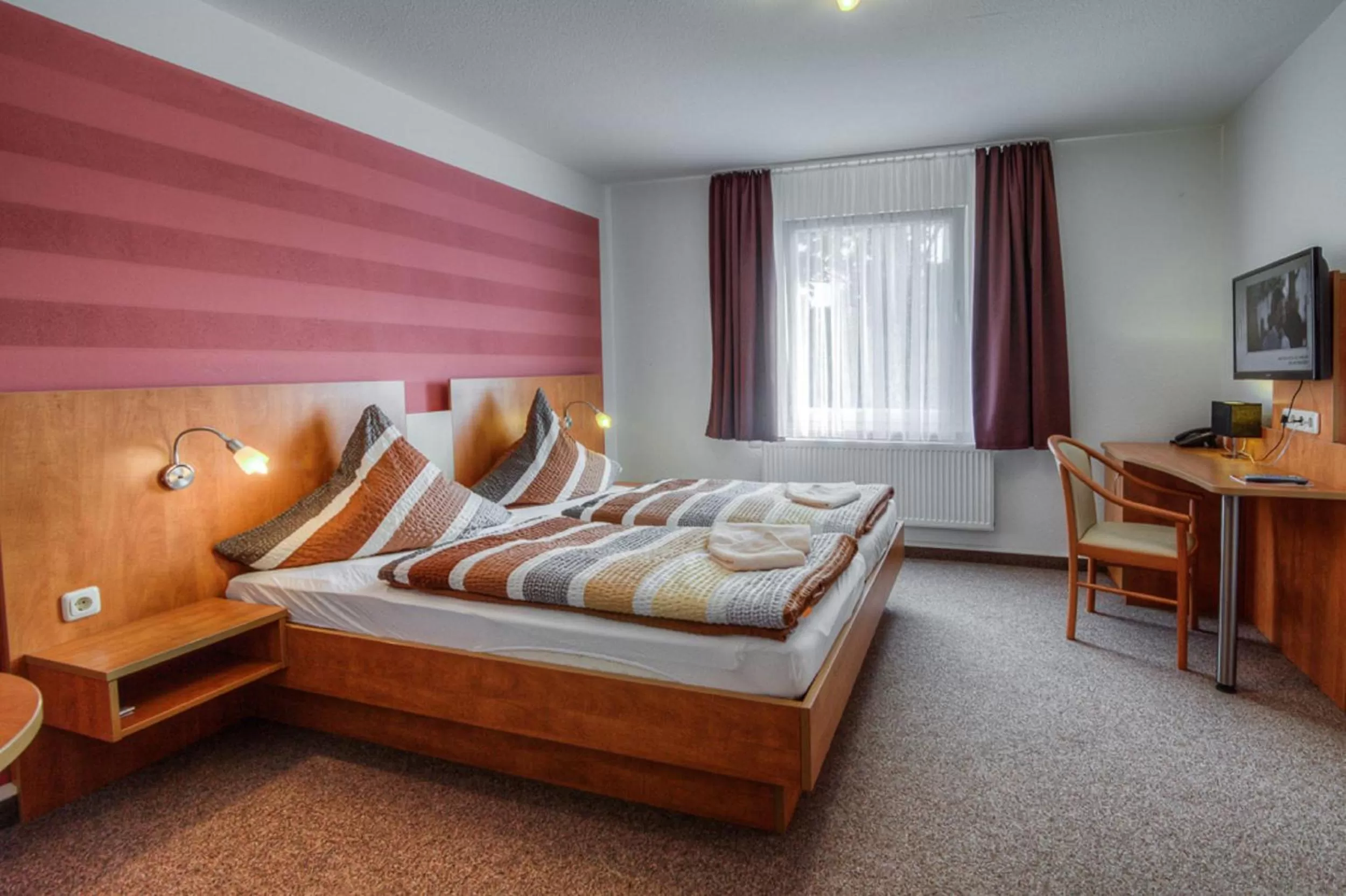 Bed in Landhotel & Brauhaus Prignitzer Hof