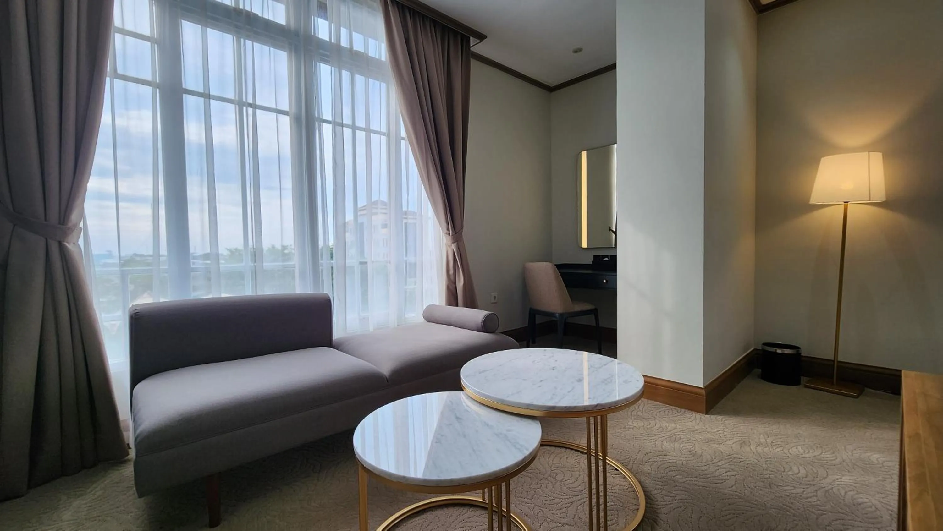 Living room in Hotel Dafam Semarang