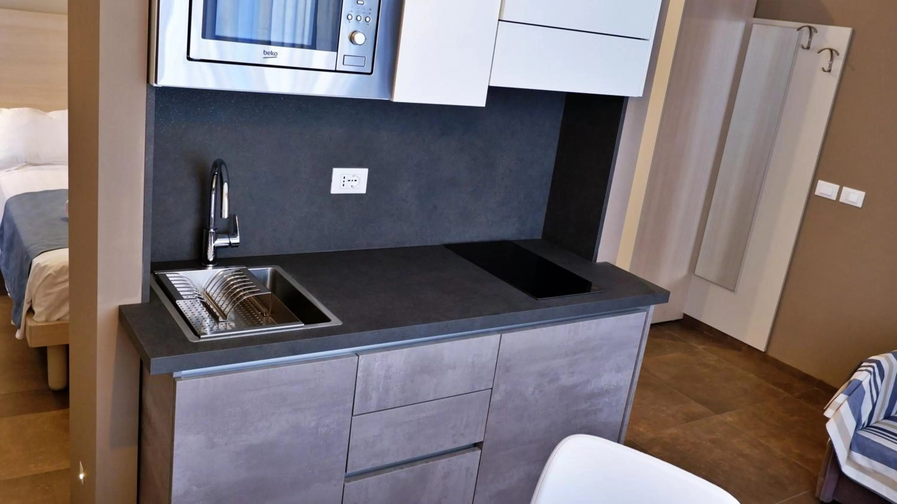 Kitchen/Kitchenette in Pianomare Riviera Apartments and Rooms