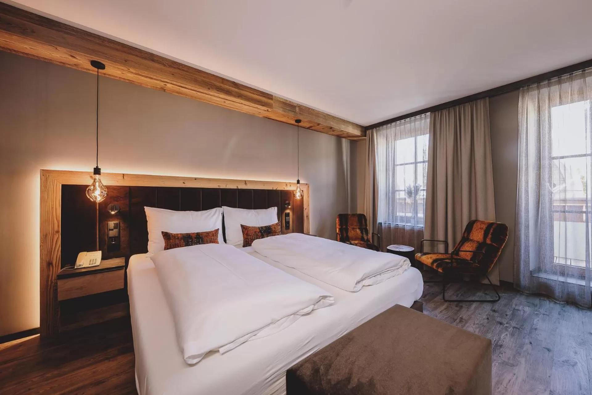 Photo of the whole room, Bed in POST POST Hotel - Alpine Boutique Hotel & Spa