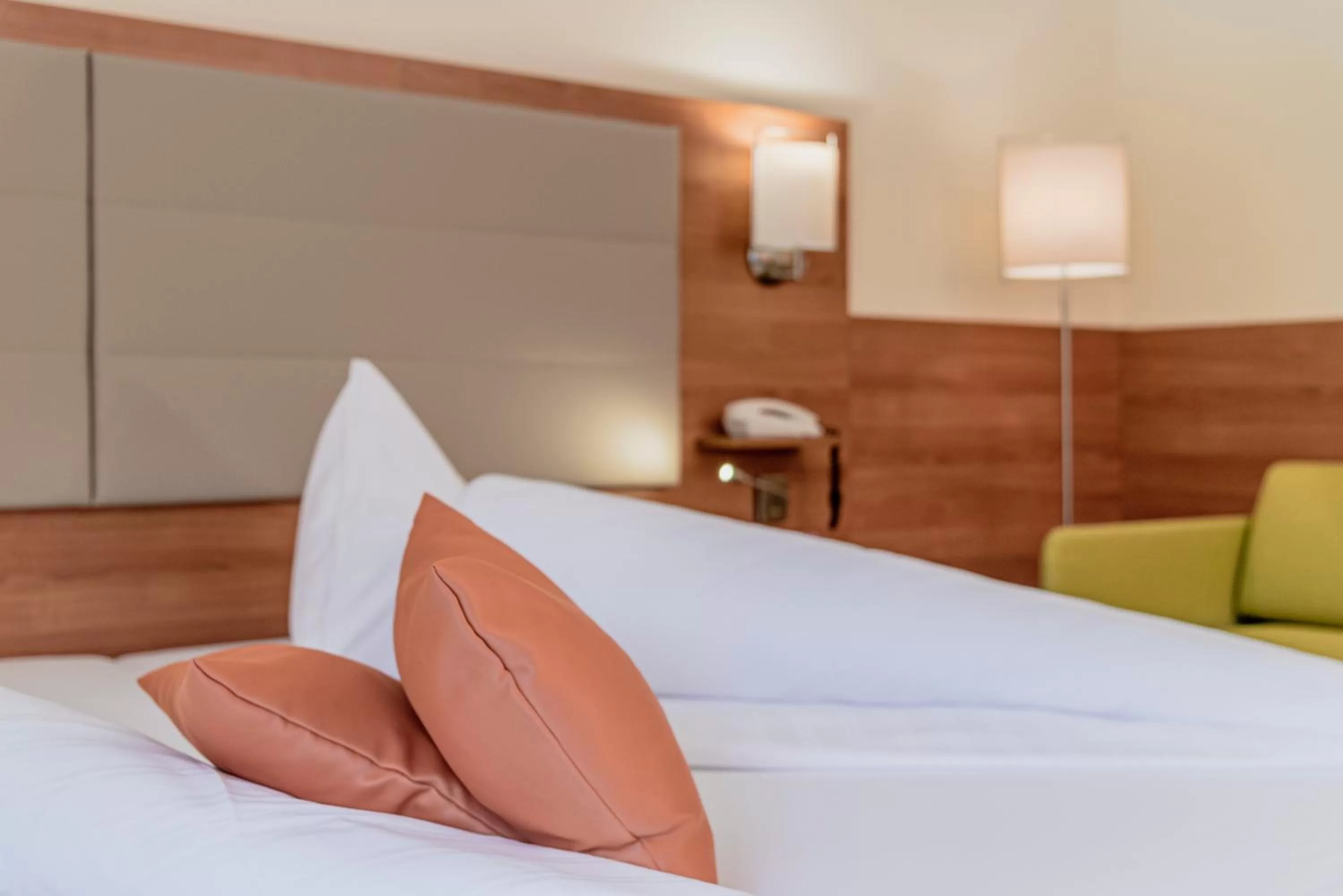 Bed in Wohlfühlhotel Goiserer Mühle