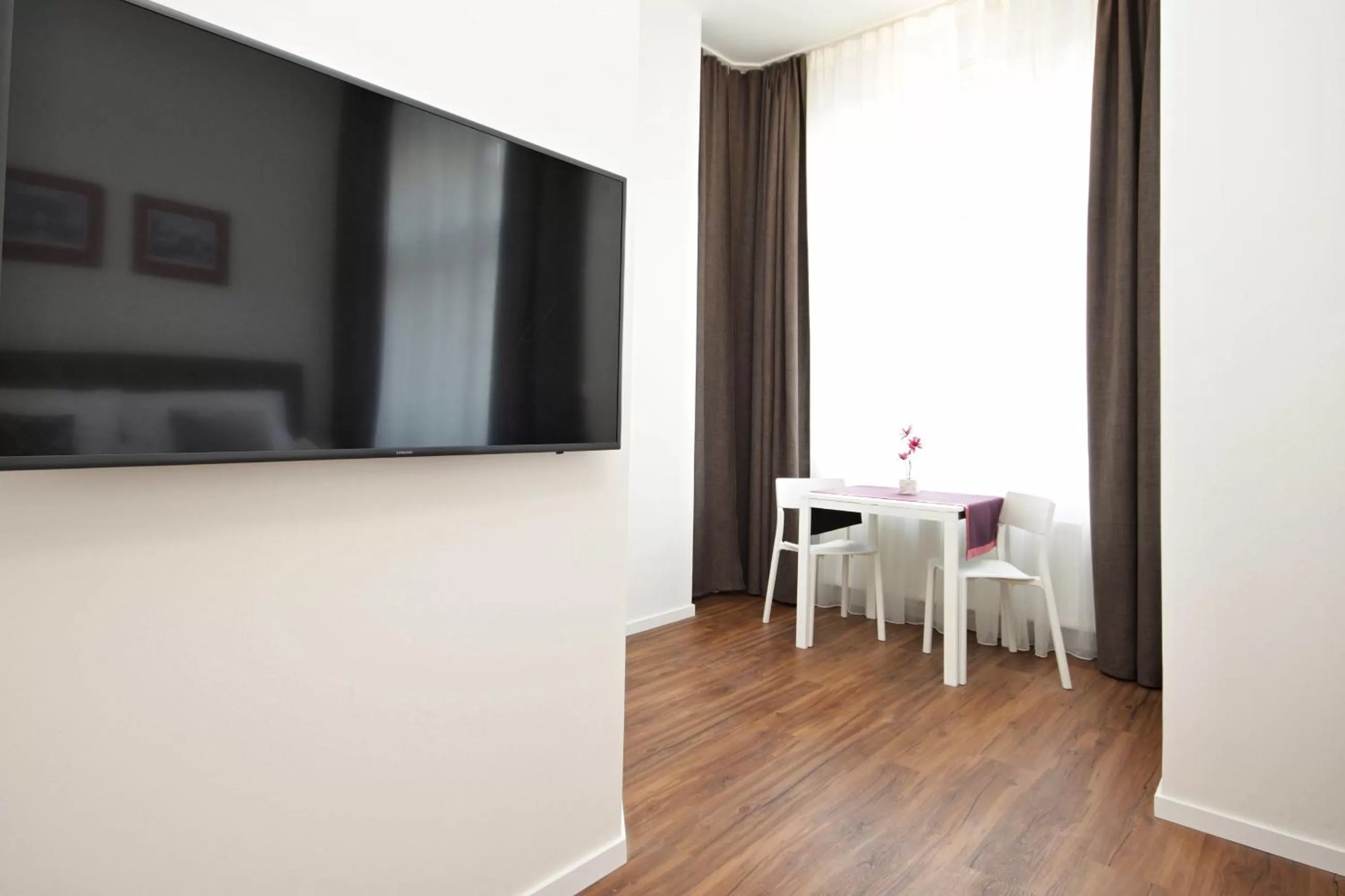 Communal lounge/ TV room in Elizabeth Suites