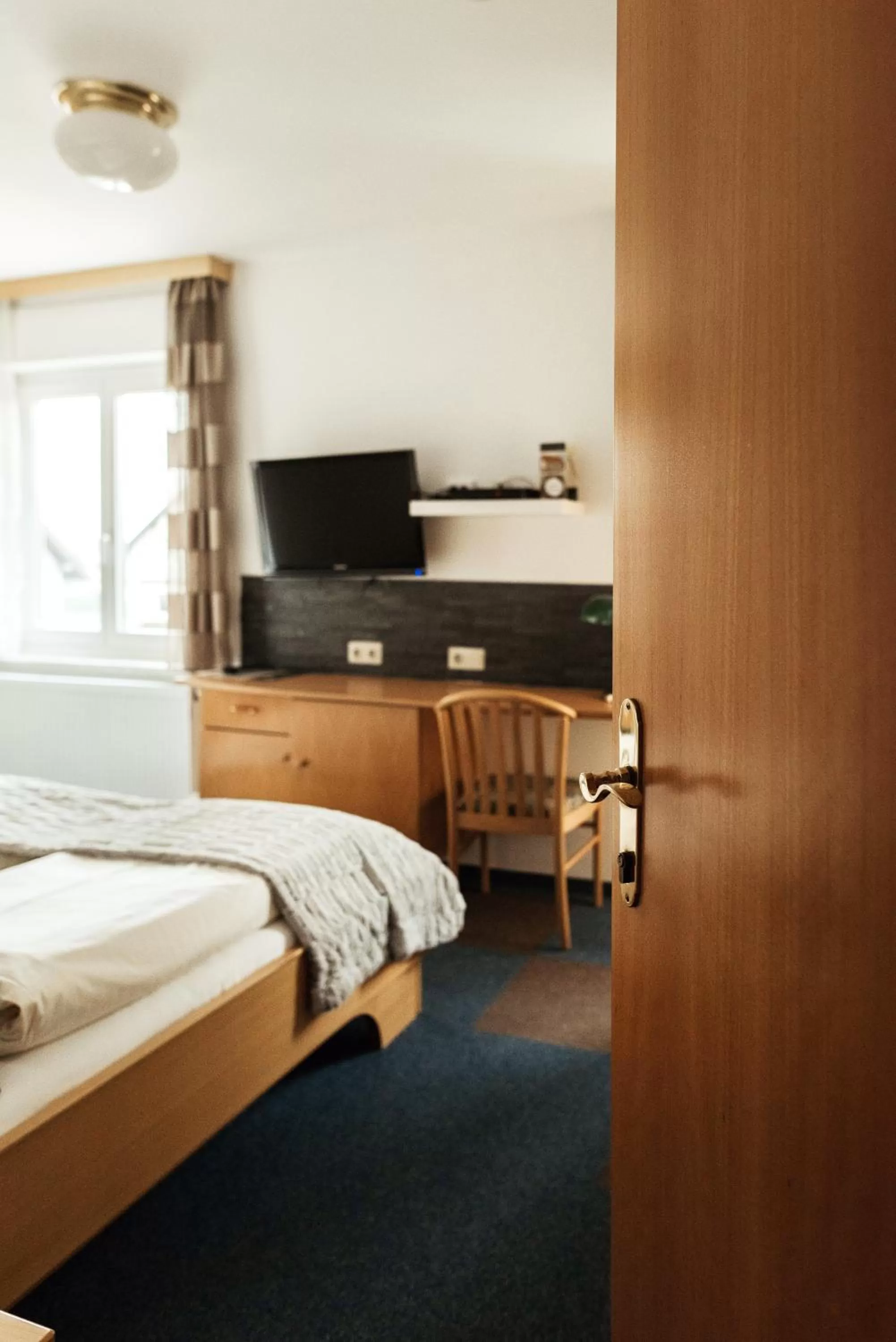 Bed in Restaurant Gästehaus Feldkirchen