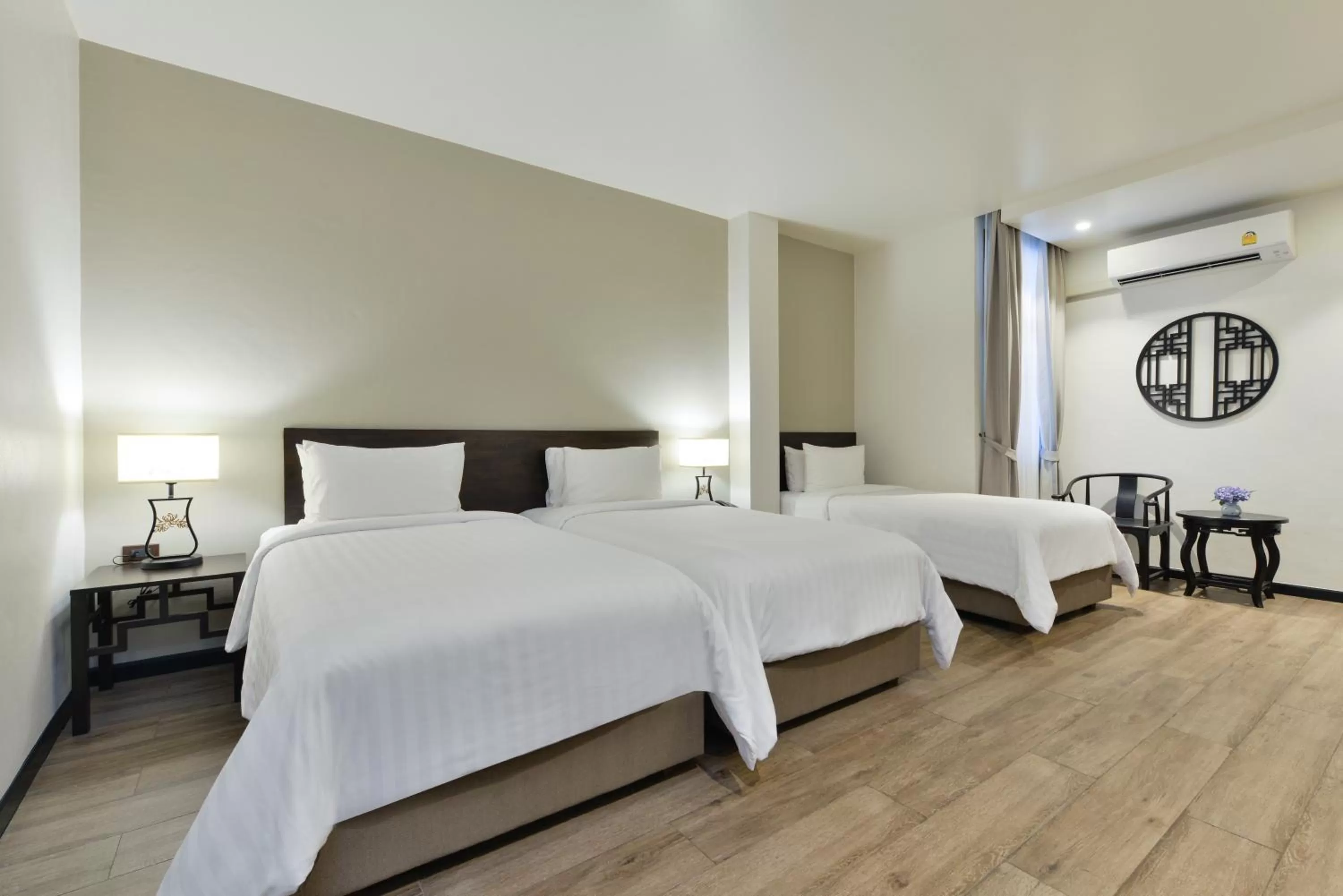 Bed in Oldthaiheng Hotel