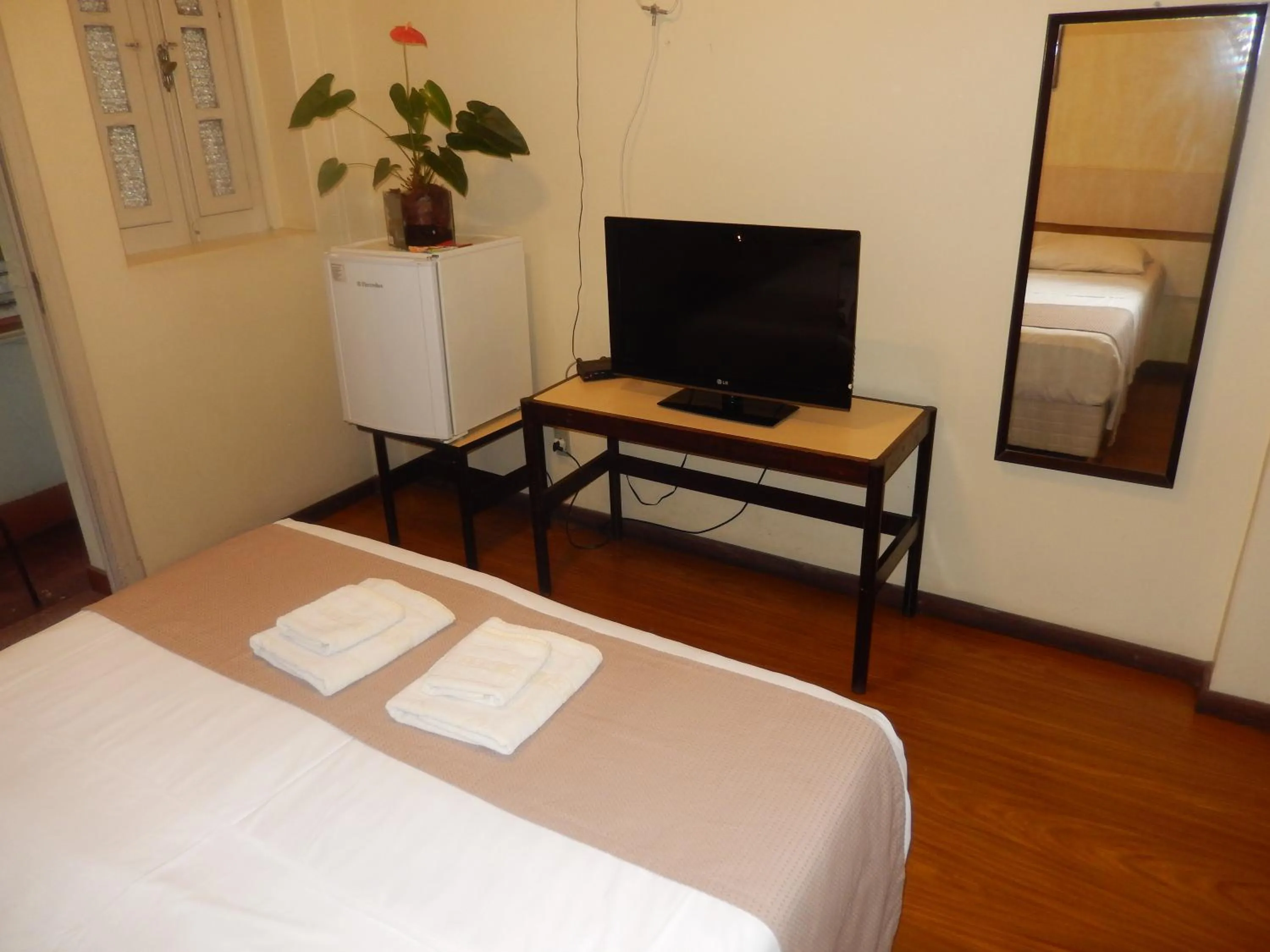 Bed in Hotel Metropole