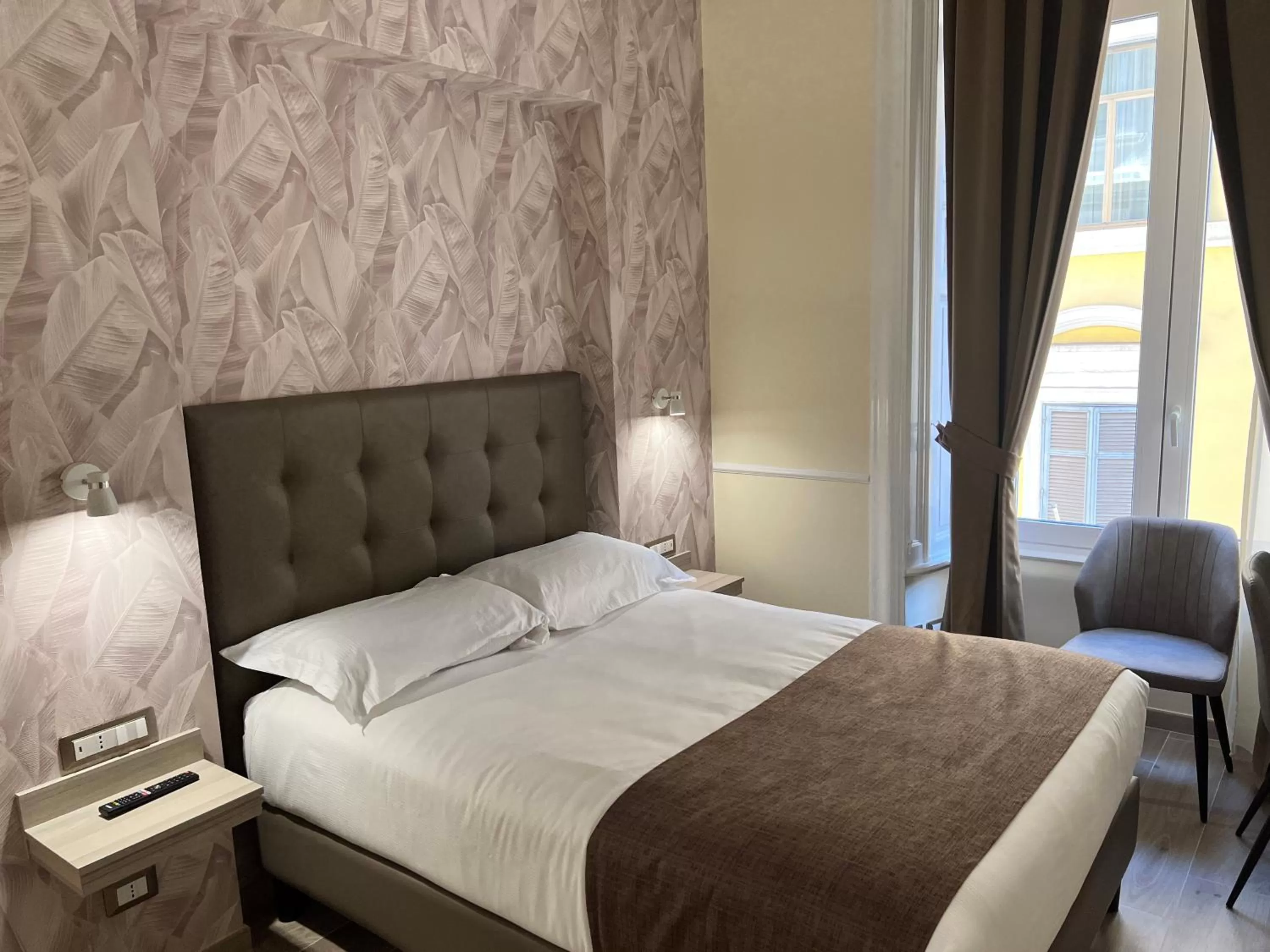 Bed in Hotel Le Petit