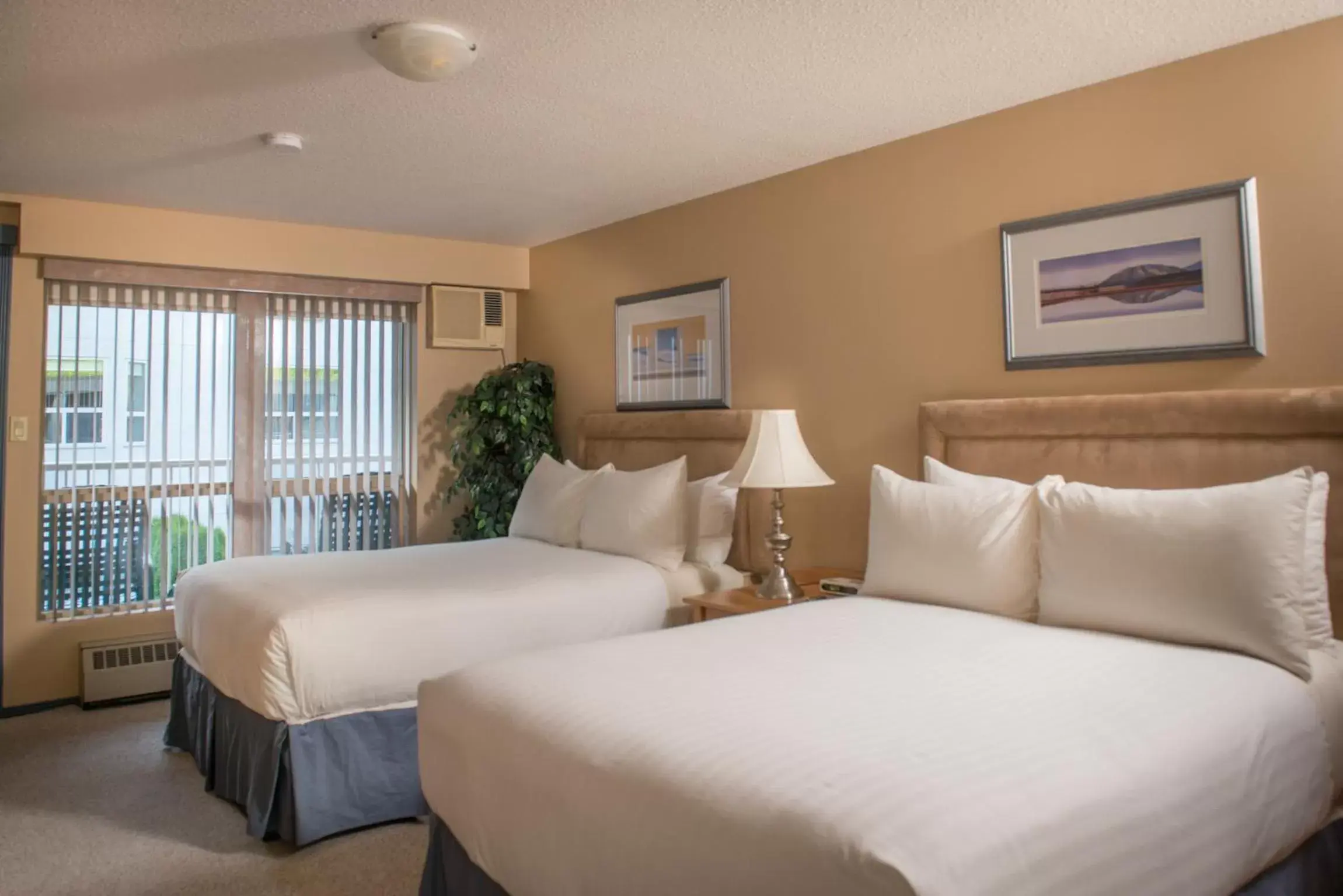 Standard Double Room with Two Double Beds - Pool View in Hilltop Inn - Salmon Arm Standard Double Room with Two Double Beds - Pool View in Hilltop Inn - Salmon Arm