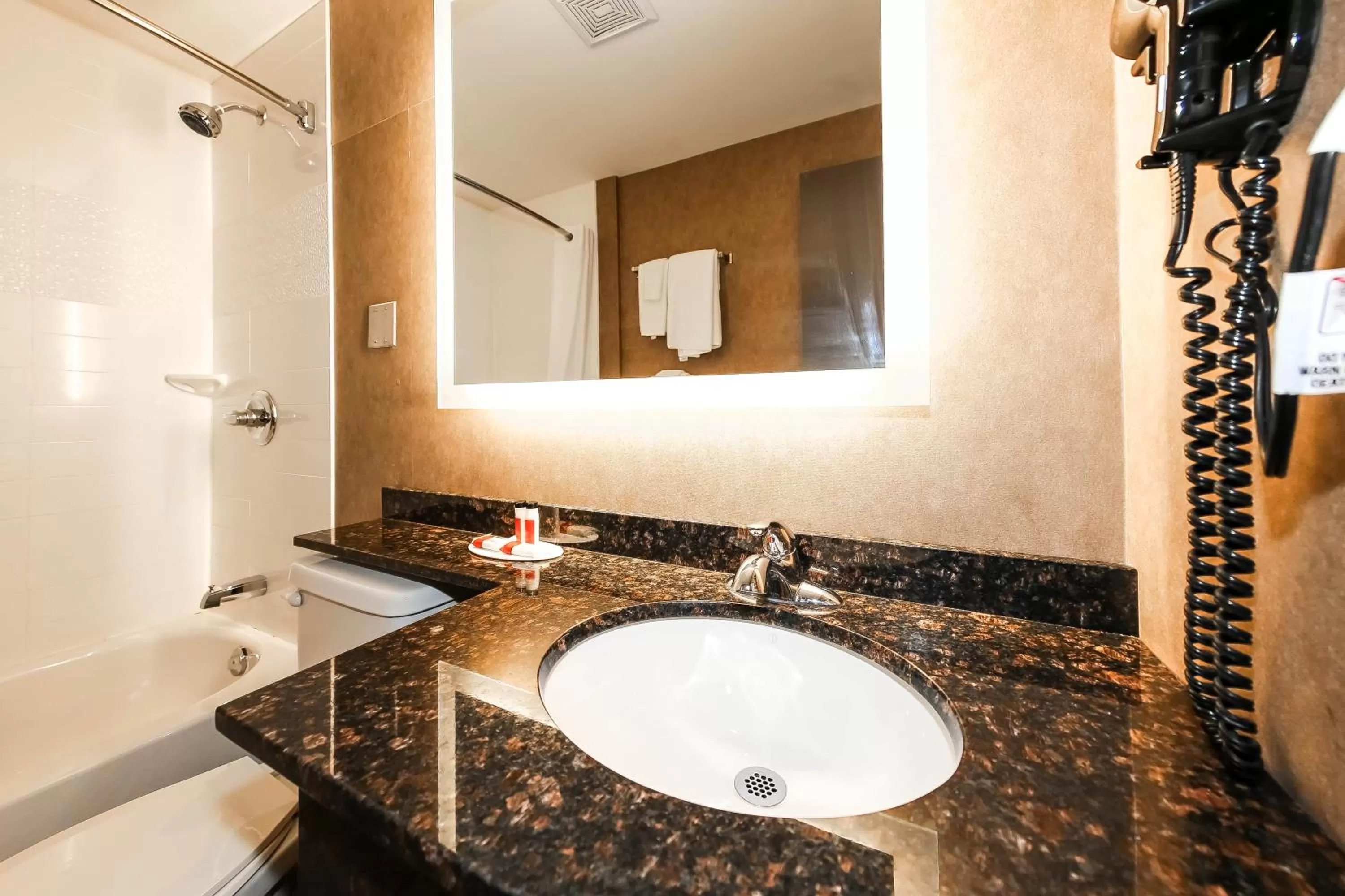 Bathroom in Howard Johnson by Wyndham Winnipeg West