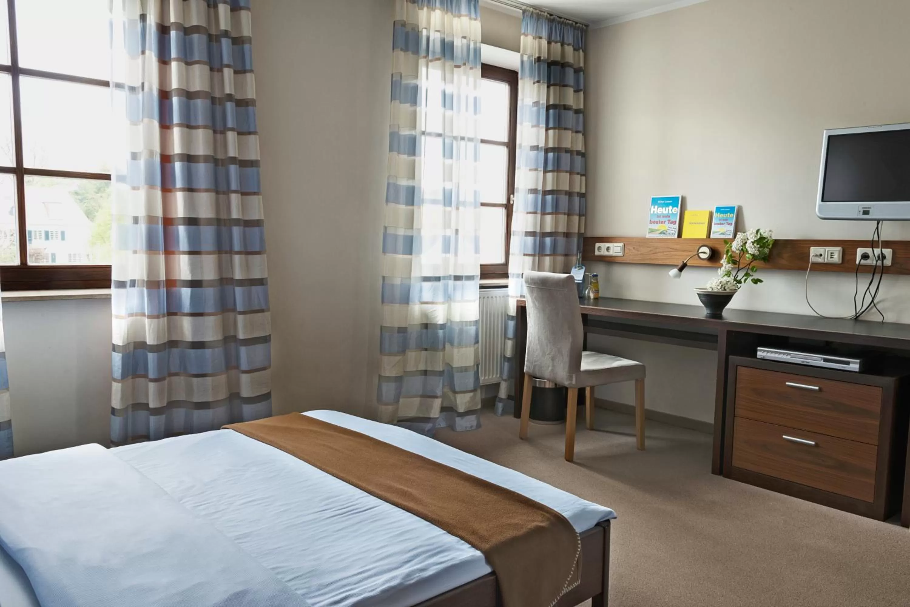 Photo of the whole room, Bed in AKZENT Hotel Laupheimer Hof