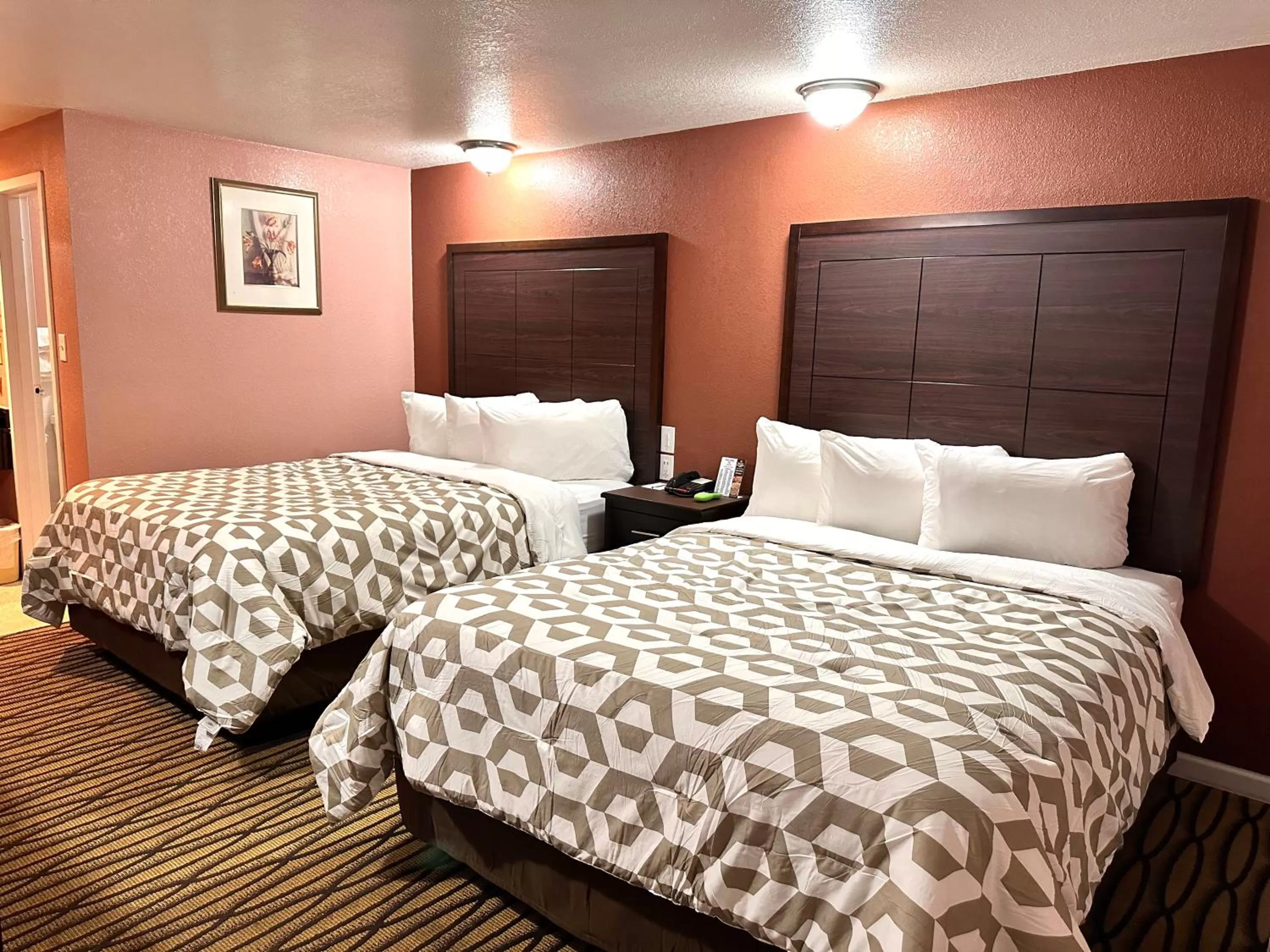 Bed in Annie Oakley Motel Oakley