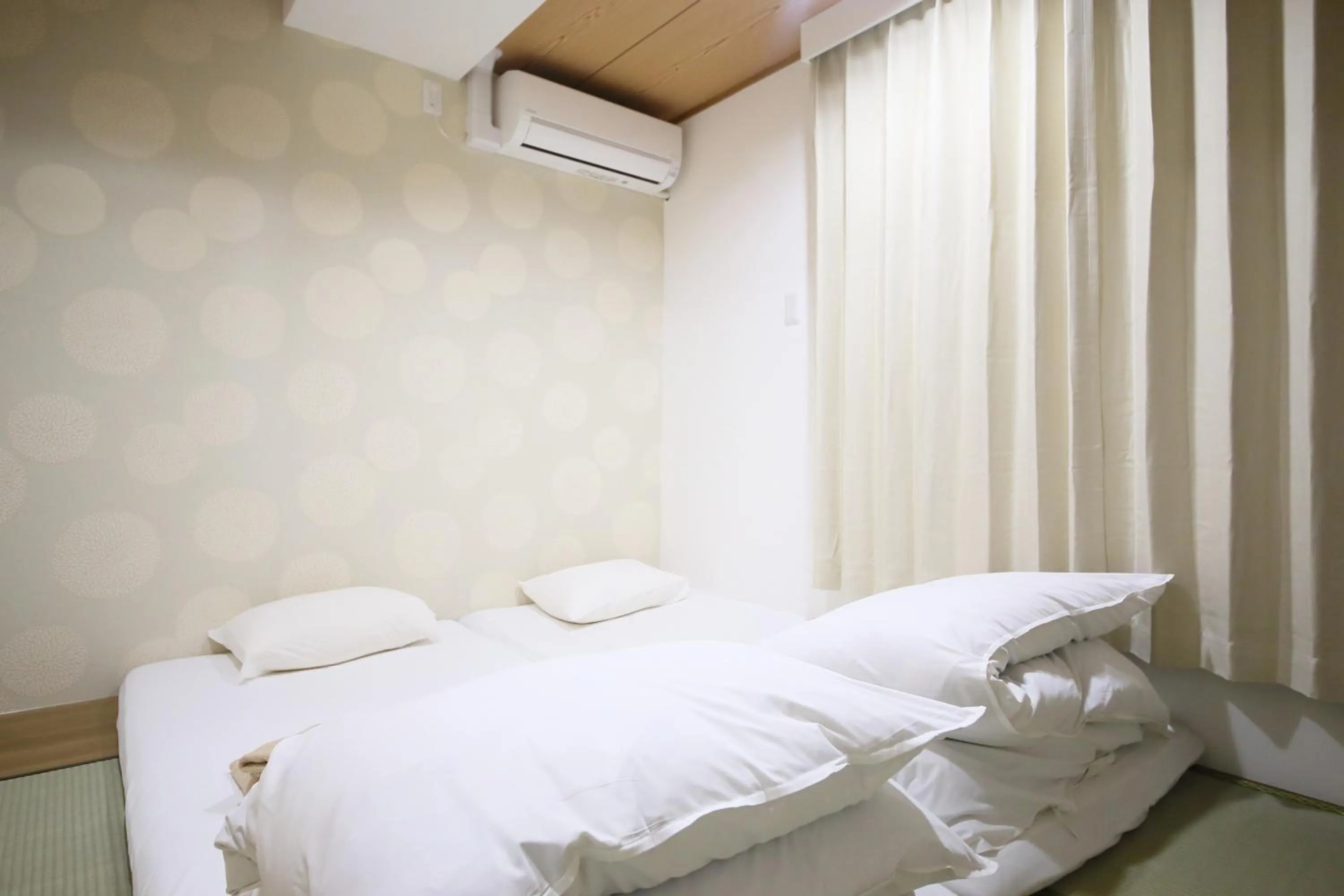 Bed in Hotel Shin-Imamiya