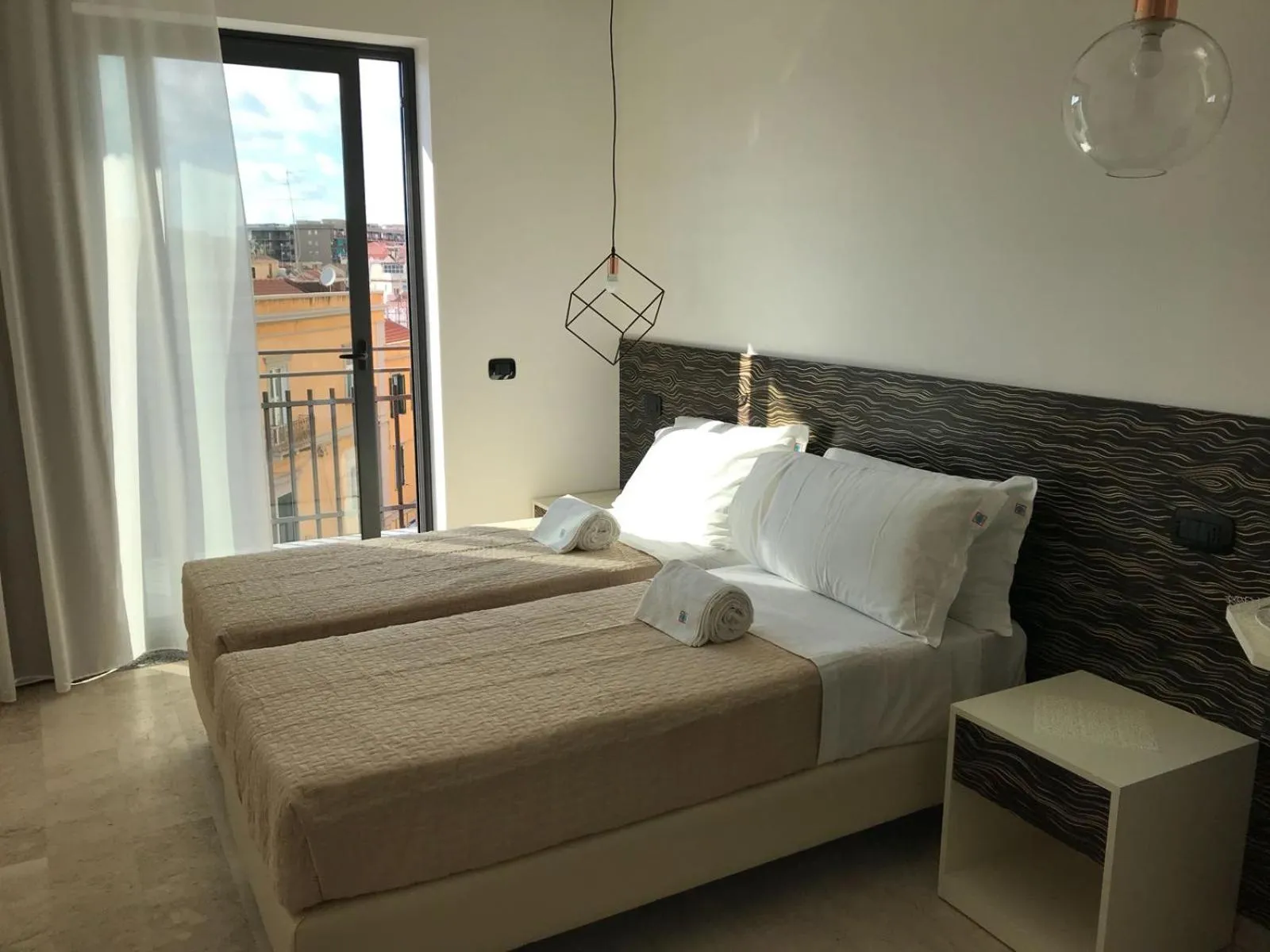 Bed in Albergo Milazzo Inn AiMori