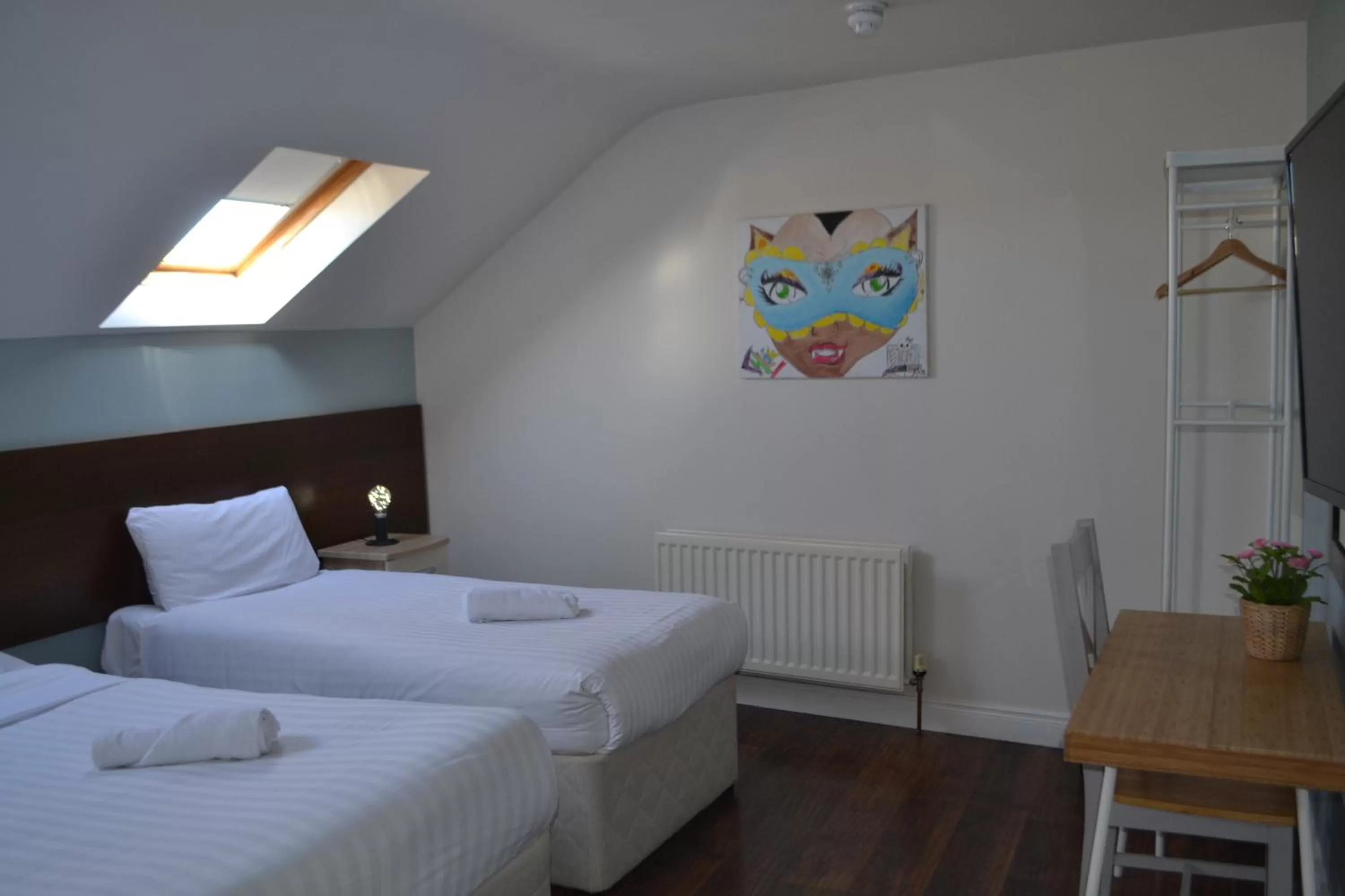 Bed in Walsh's Hotel and Apartments