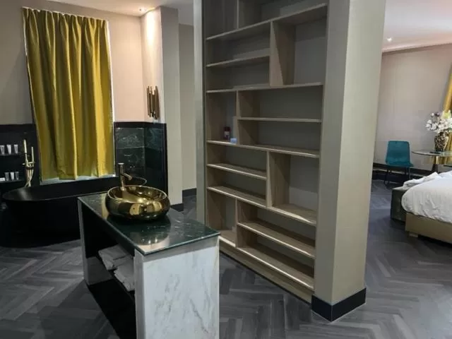 Bed in Triple G Hotels