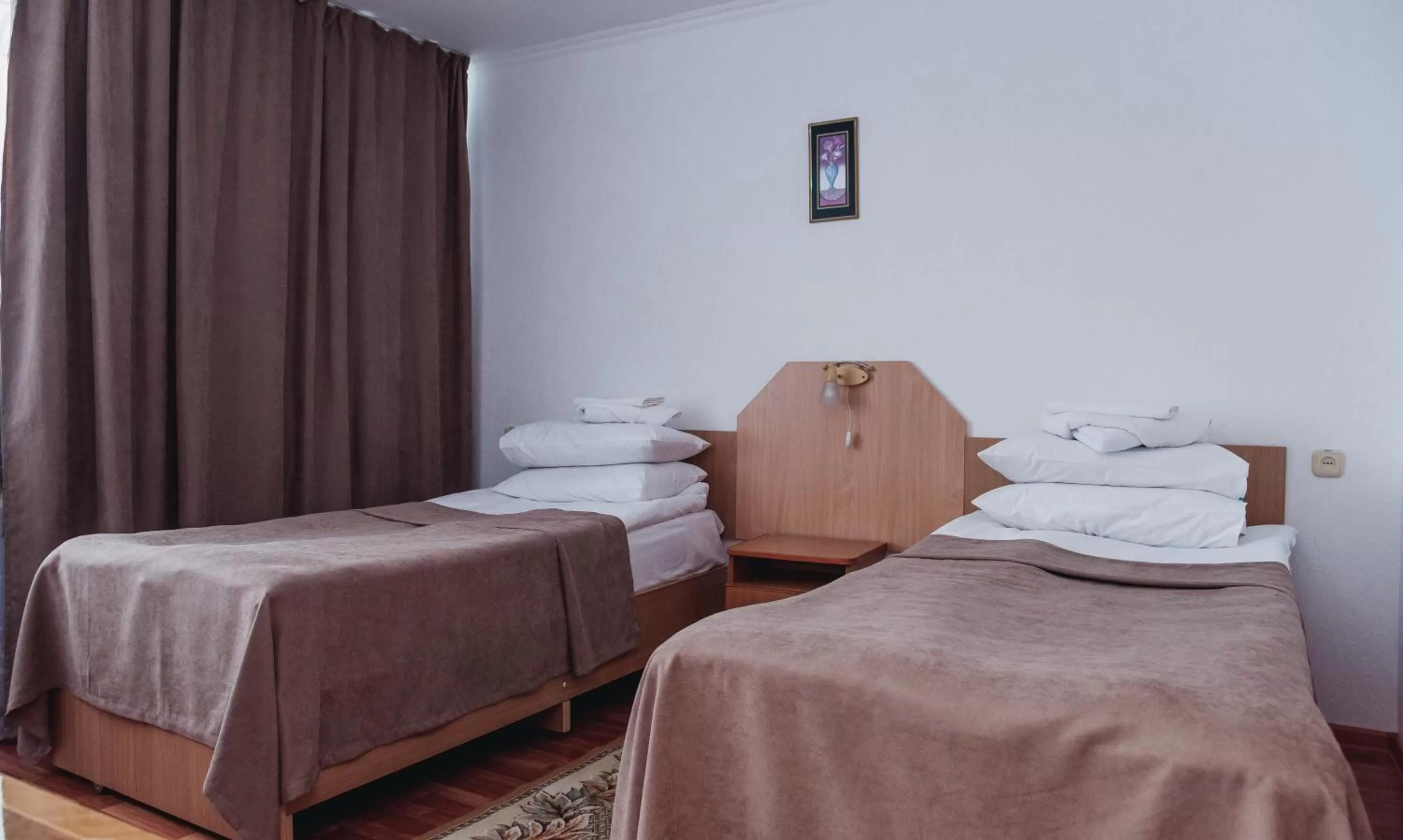 Bed in Aktobe Hotel