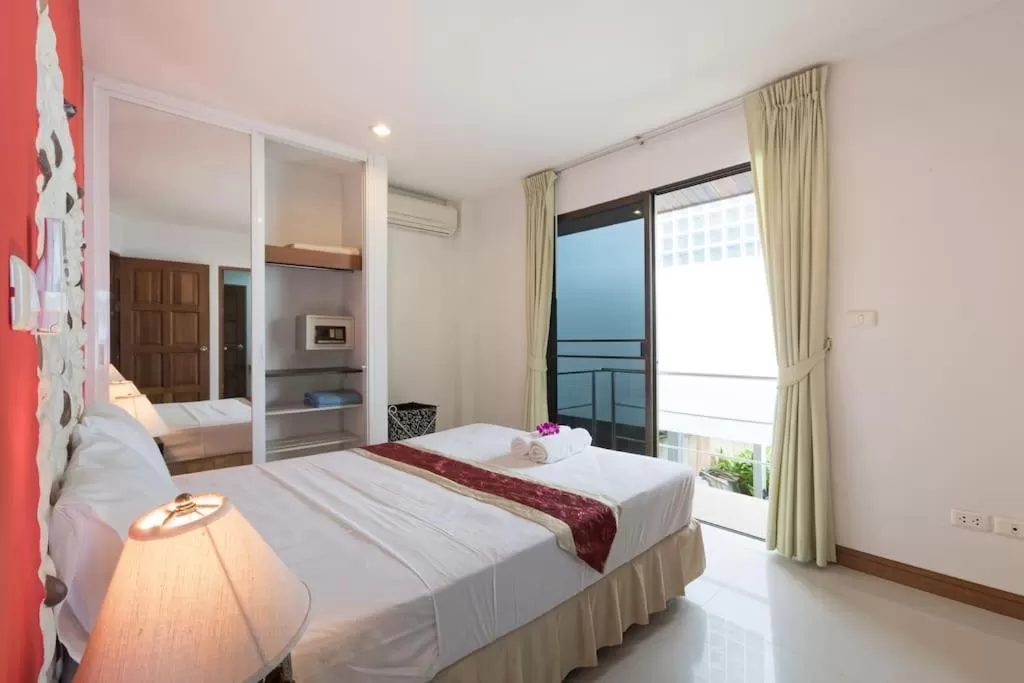Bed in Mountain Seaview Luxury Apartments
