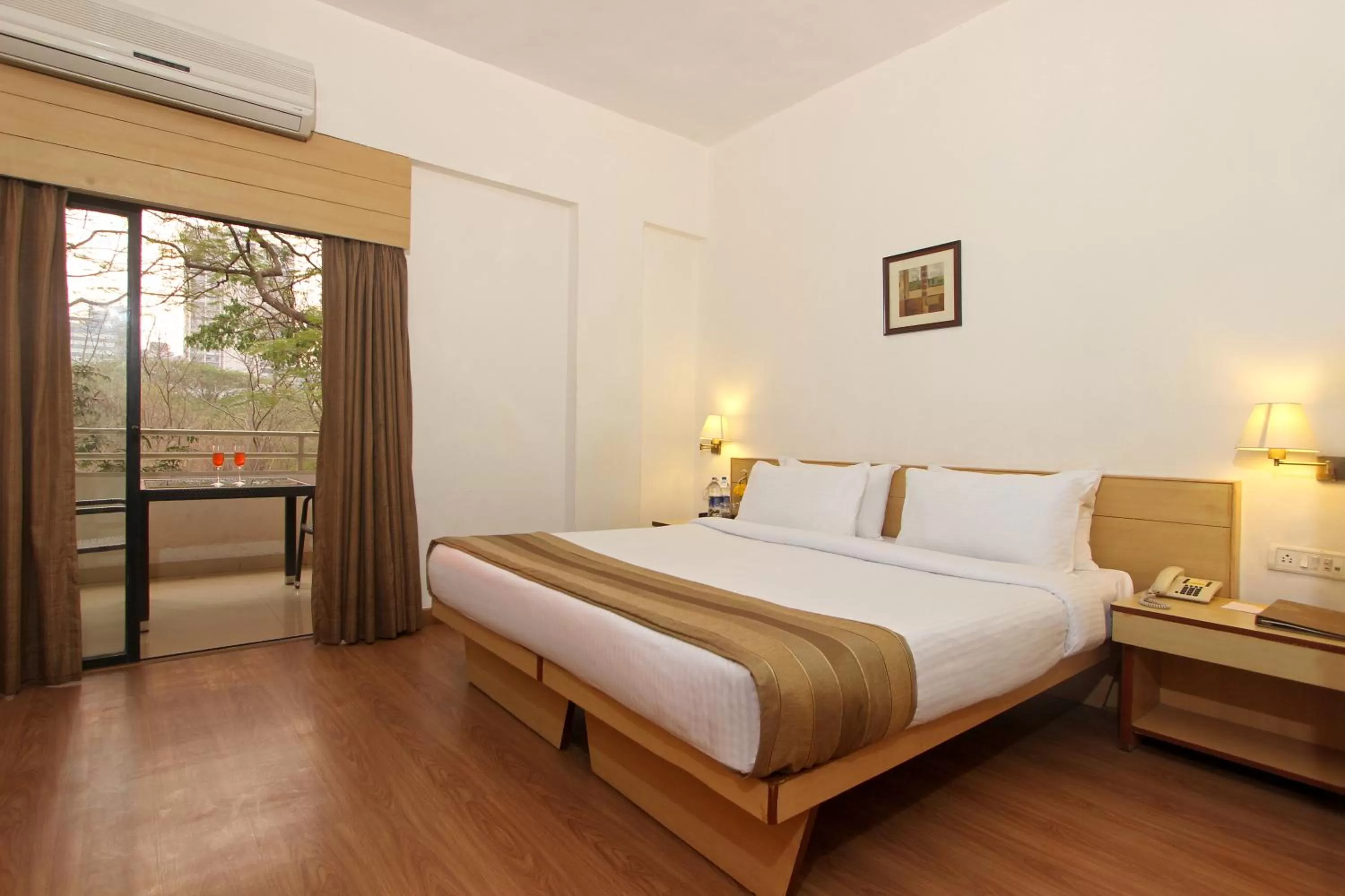Balcony/Terrace, Bed in Hotel Phoenix Koregaon Park