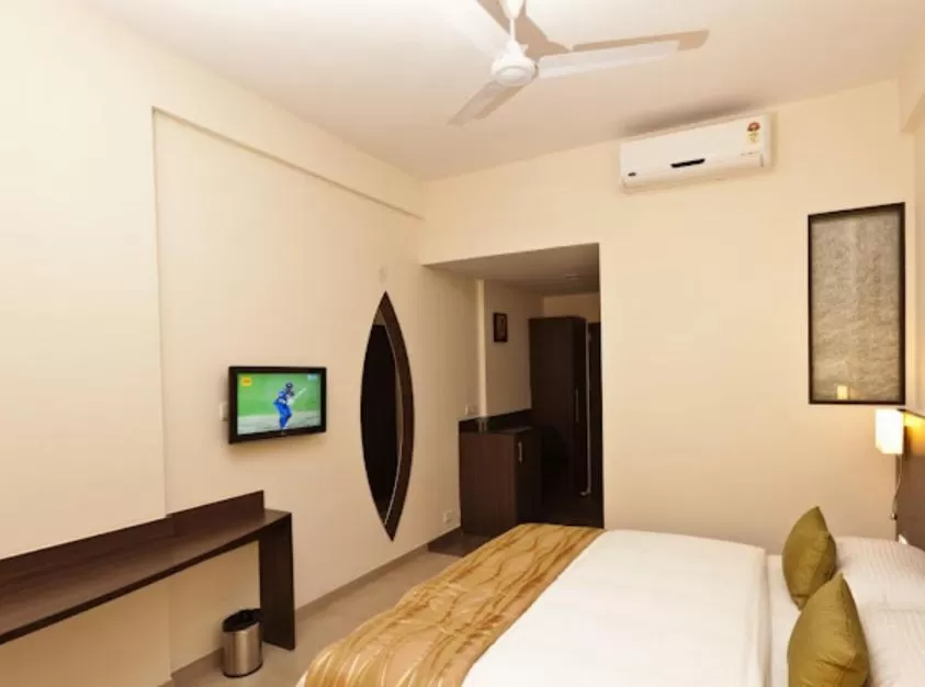 Bed in Mallige Residency