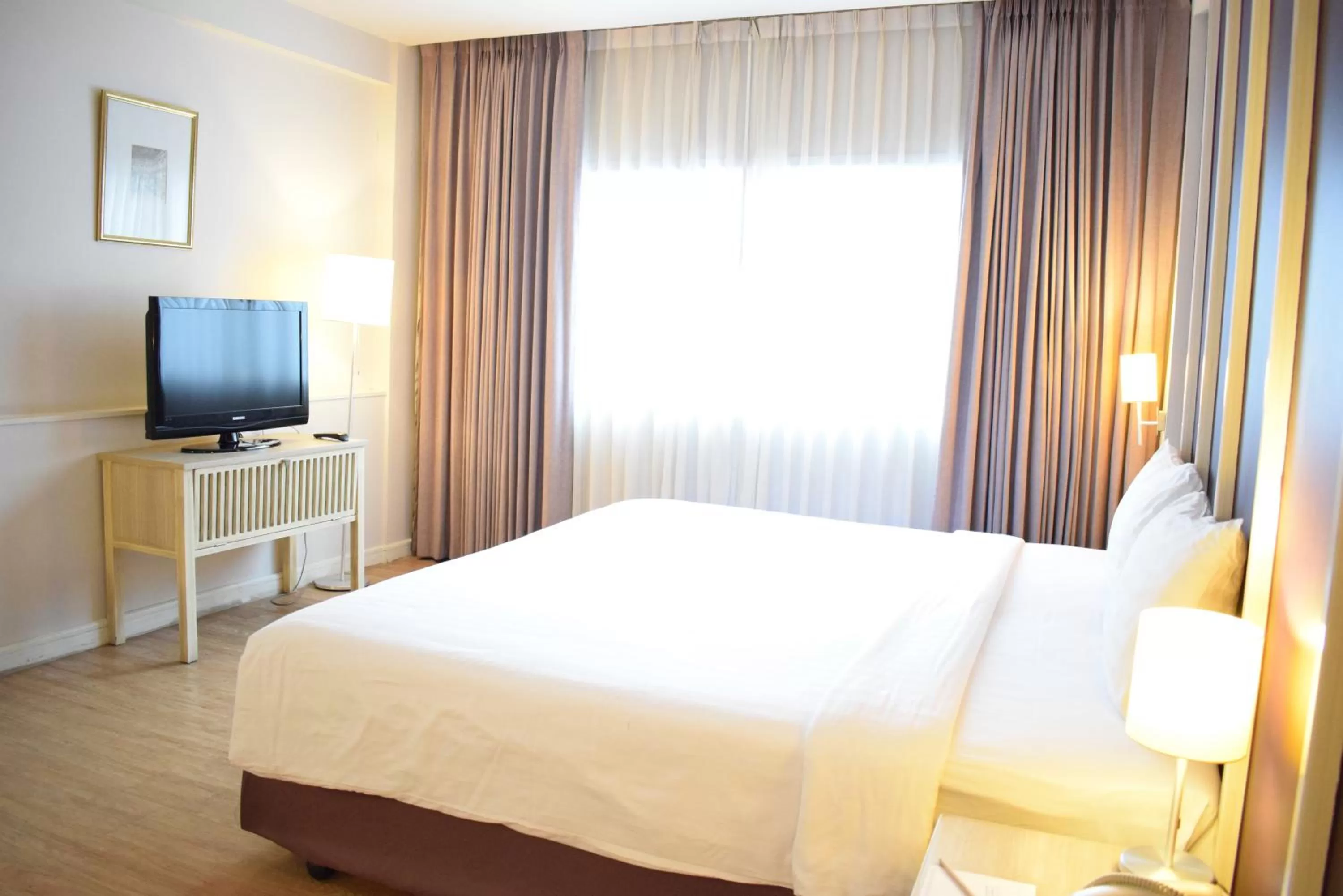 Bed in Trang Hotel Bangkok - SHA Plus