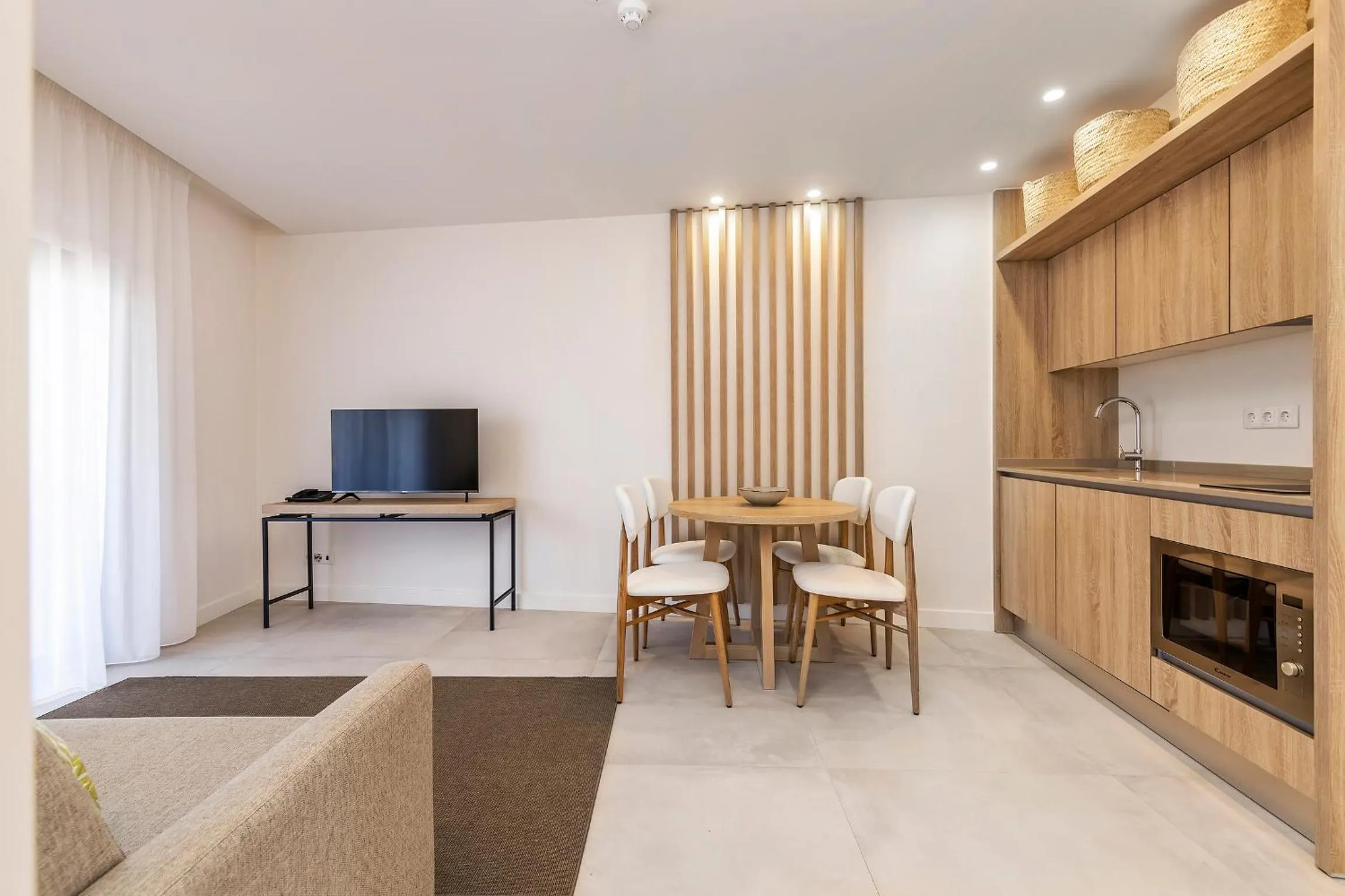 Communal lounge/ TV room in Clube Maria Luisa