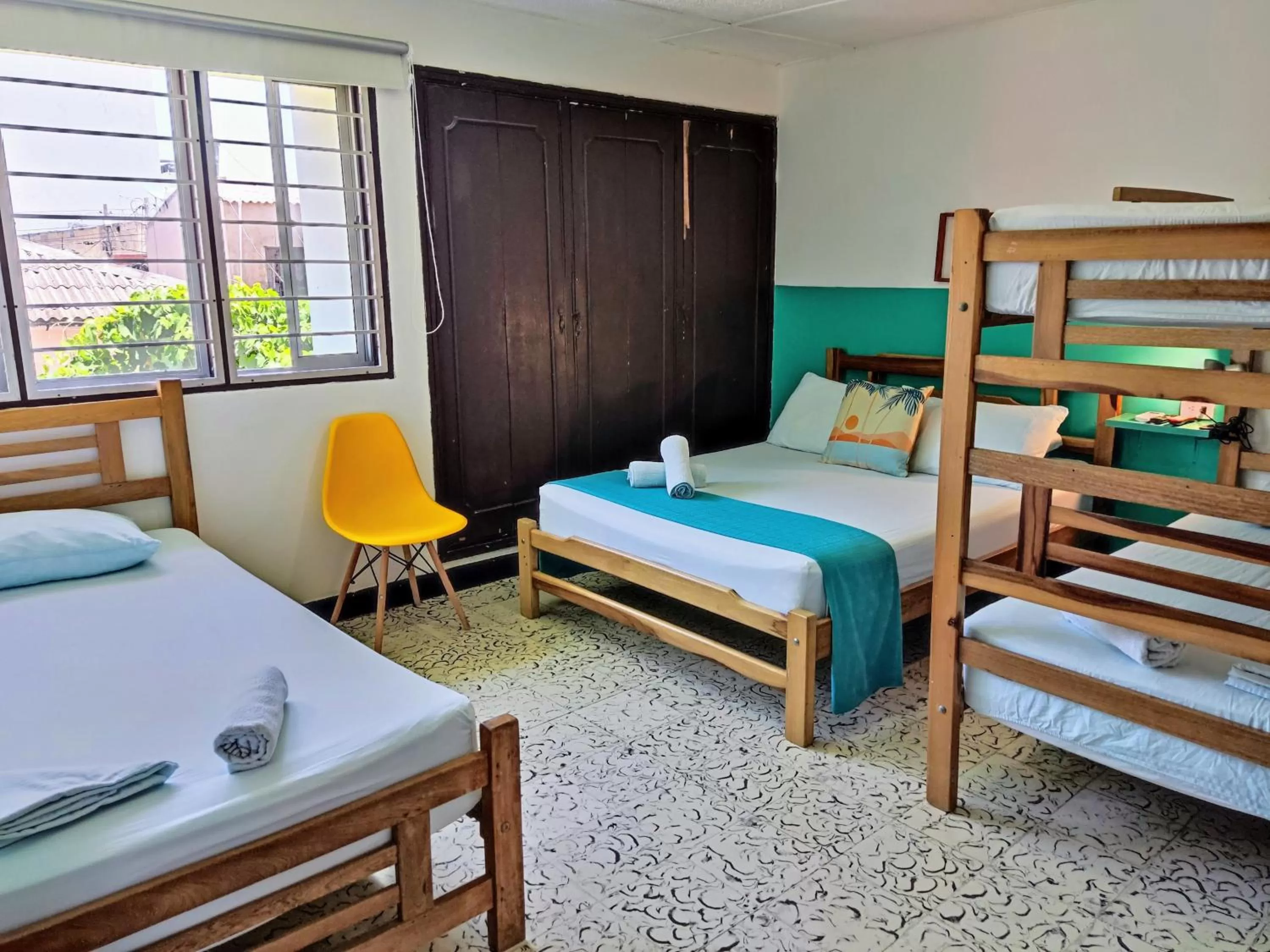 Bed in Bona Vida Hotel