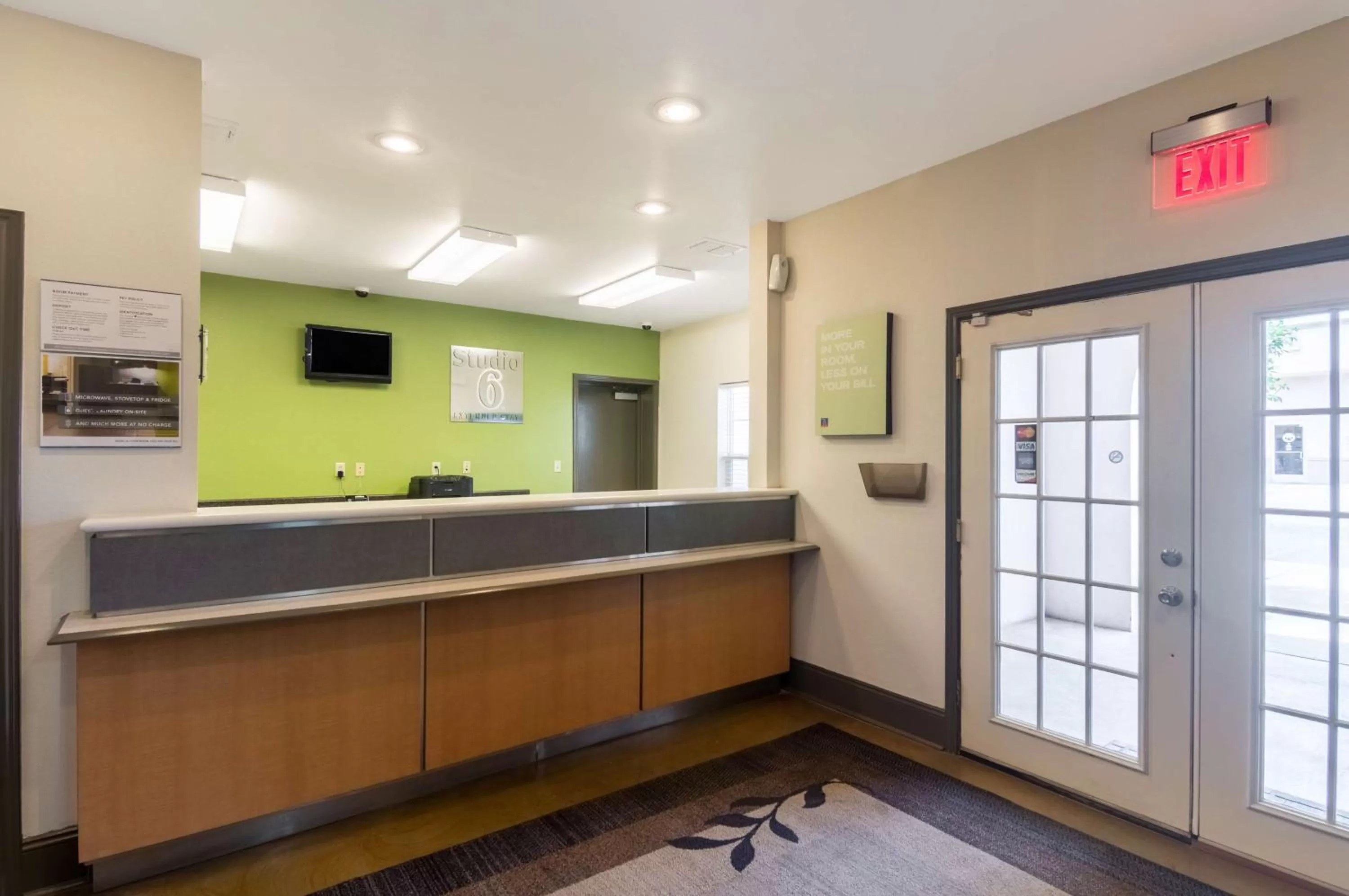 Communal lounge/ TV room in Studio 6-Lubbock, TX - Medical Center