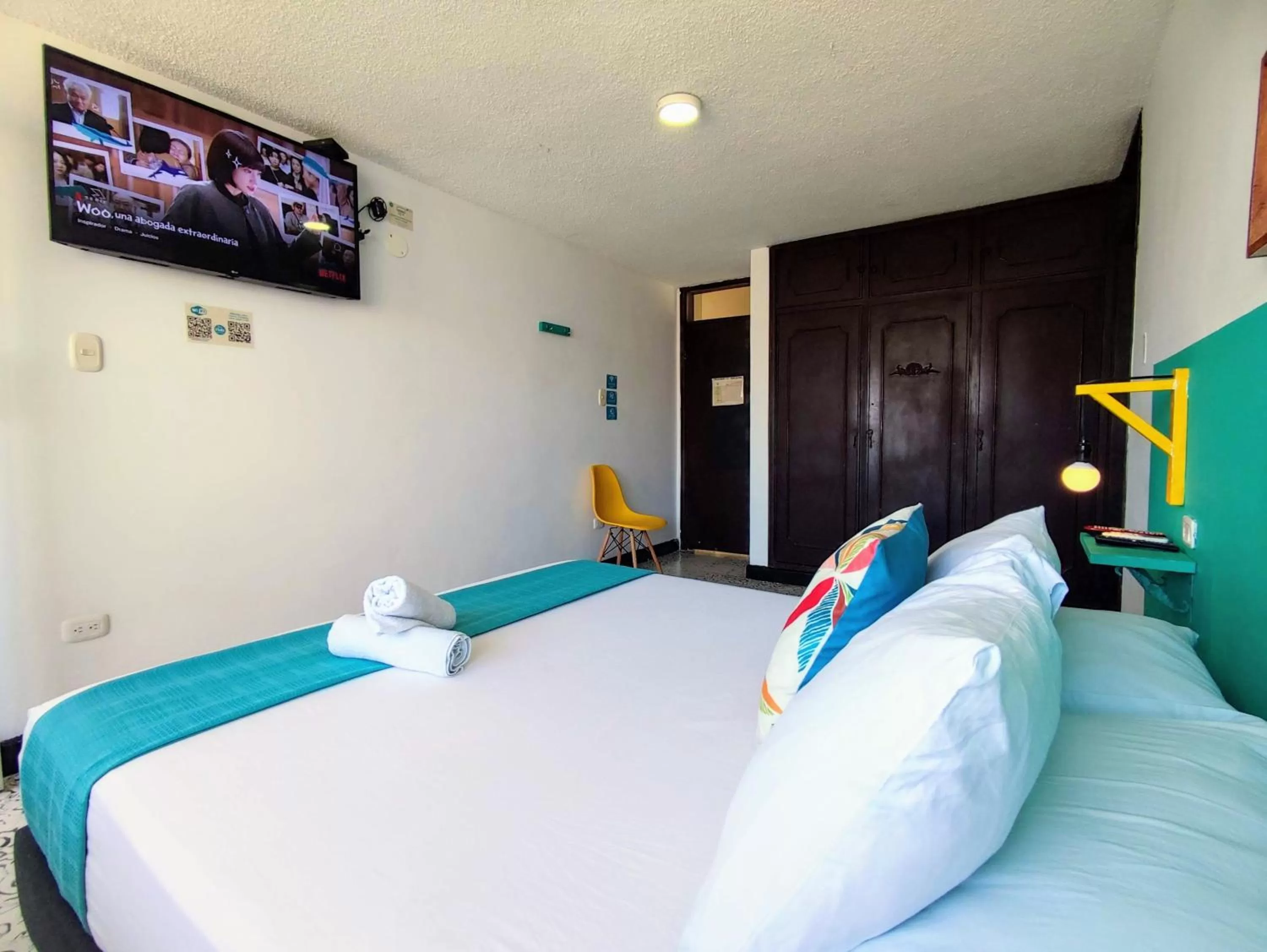 Bed in Bona Vida Hotel