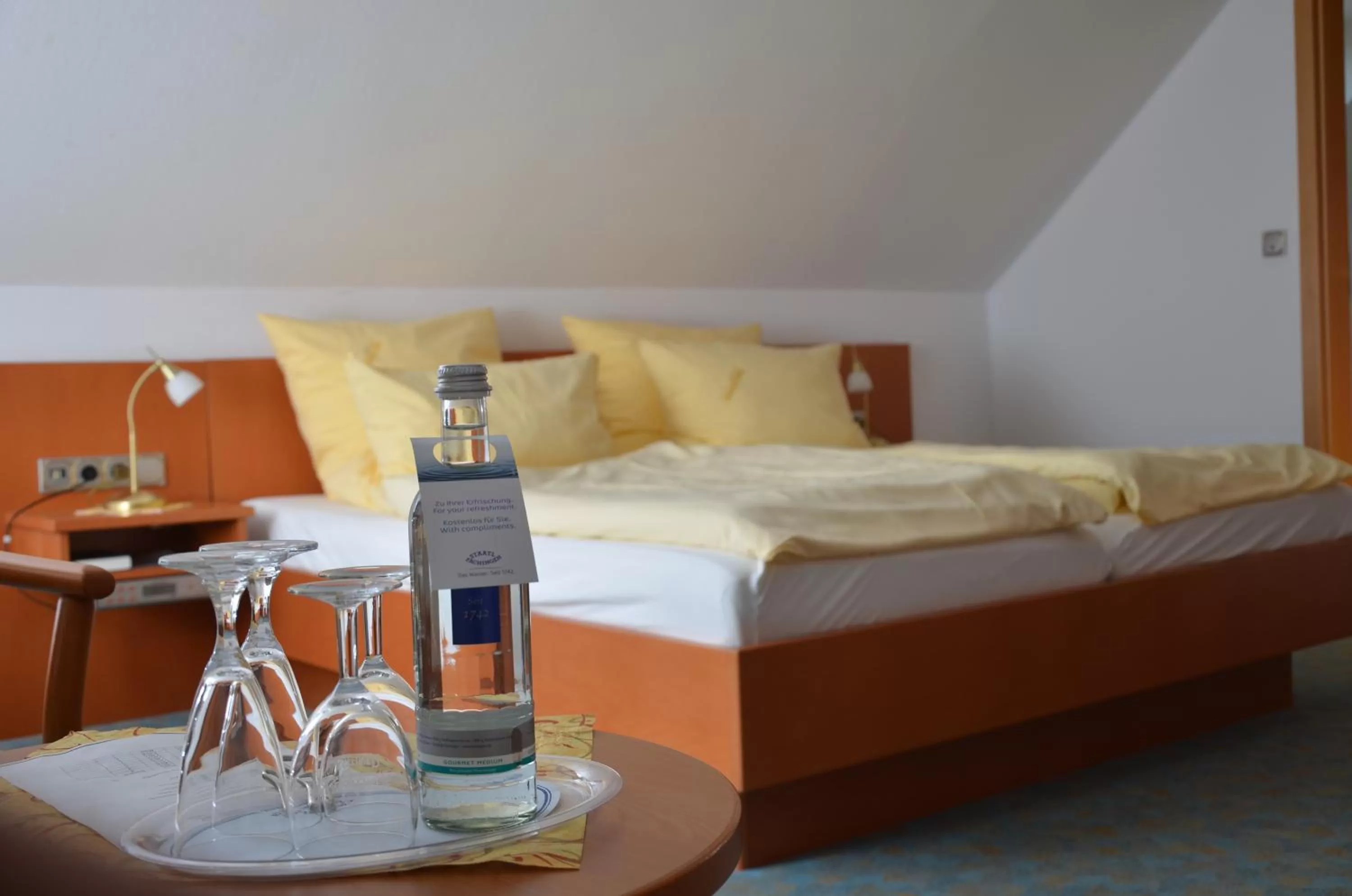 Photo of the whole room, Bed in Landhotel Butjadinger Tor