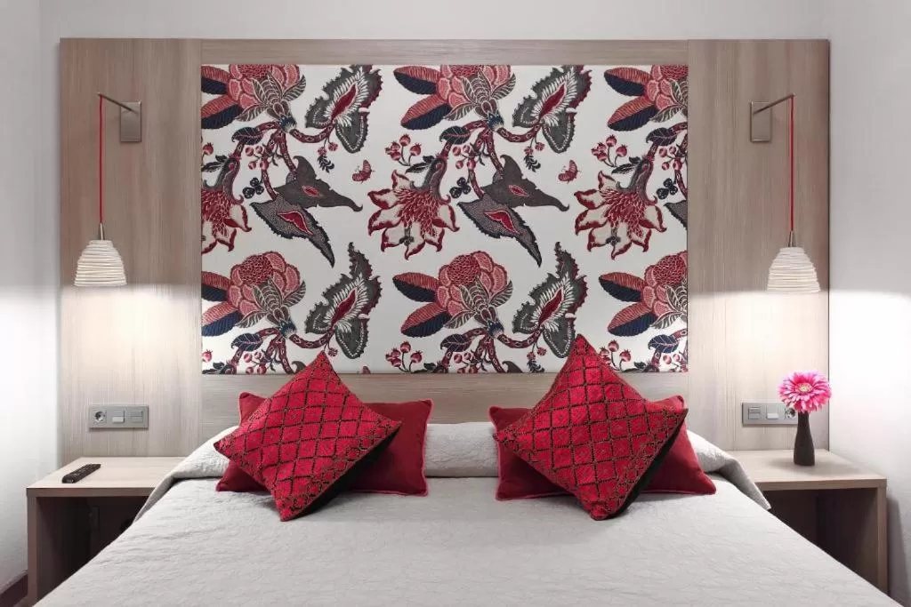 Bed in Hotel Ginebra