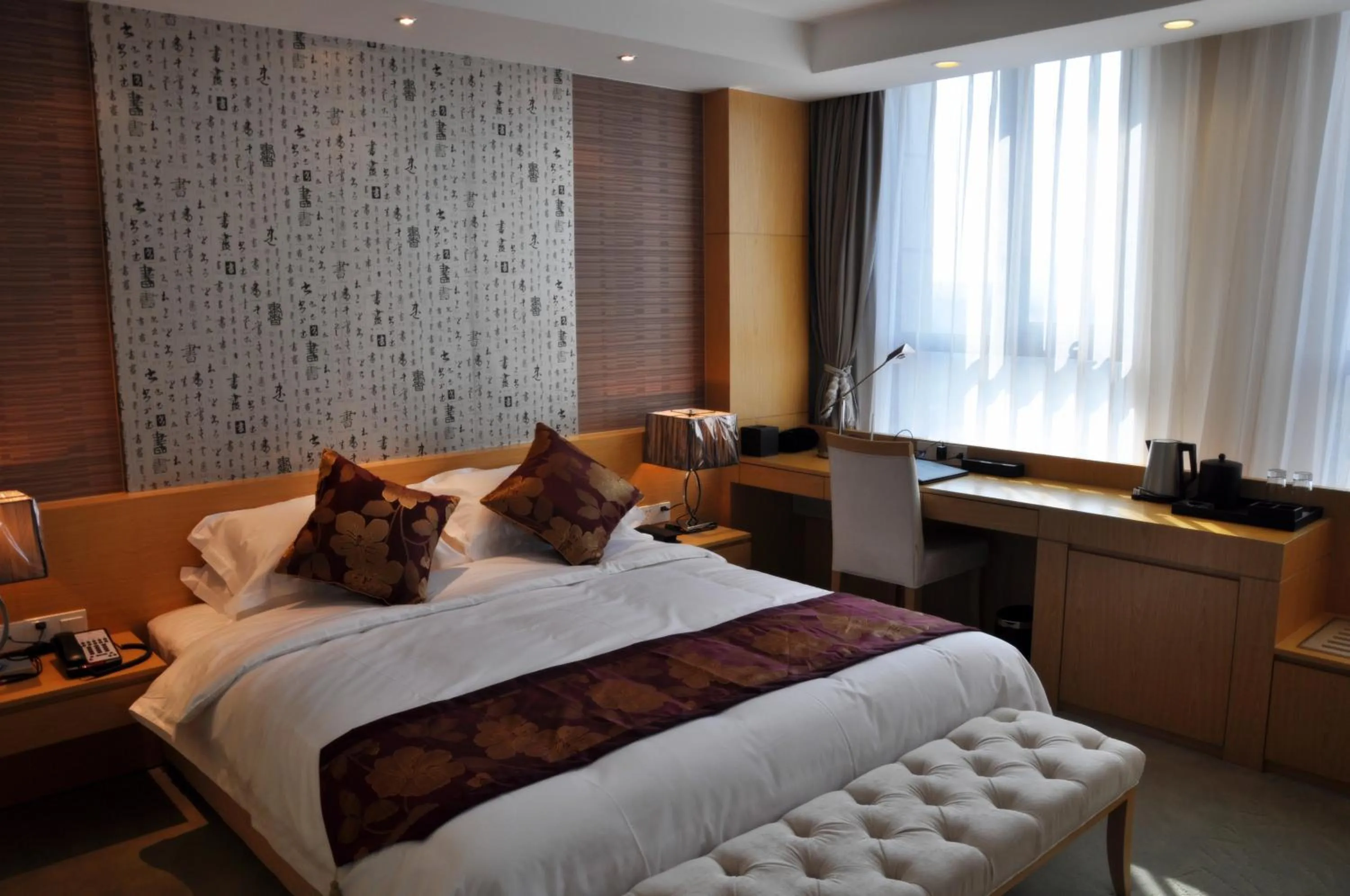 Bed in Suzhou Sun Plaza Hotel
