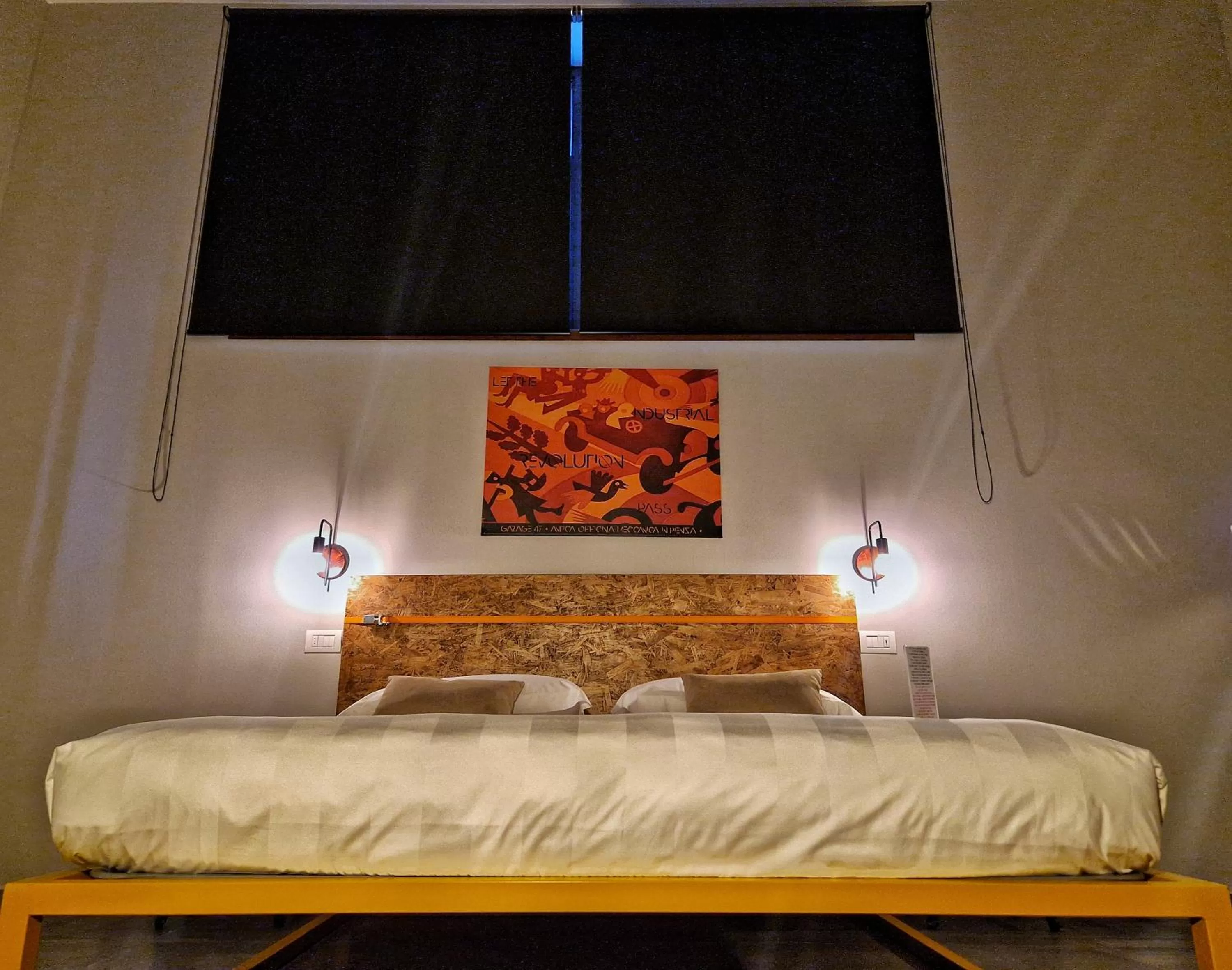 Bed in GARAGE47 Storica Officina Meccanica LOFT B&B iN PIENZA