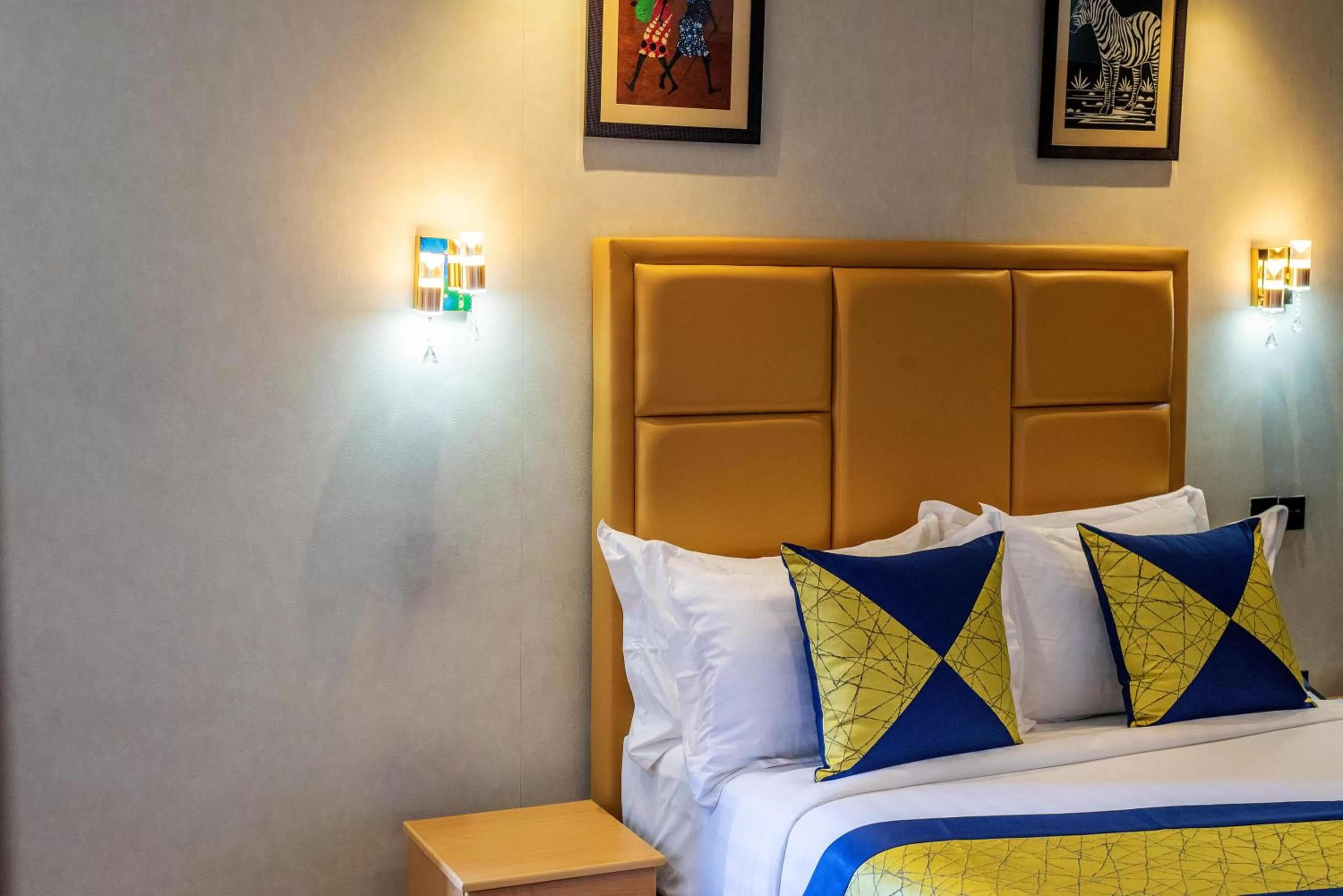 Bed in Afro Park Hotel