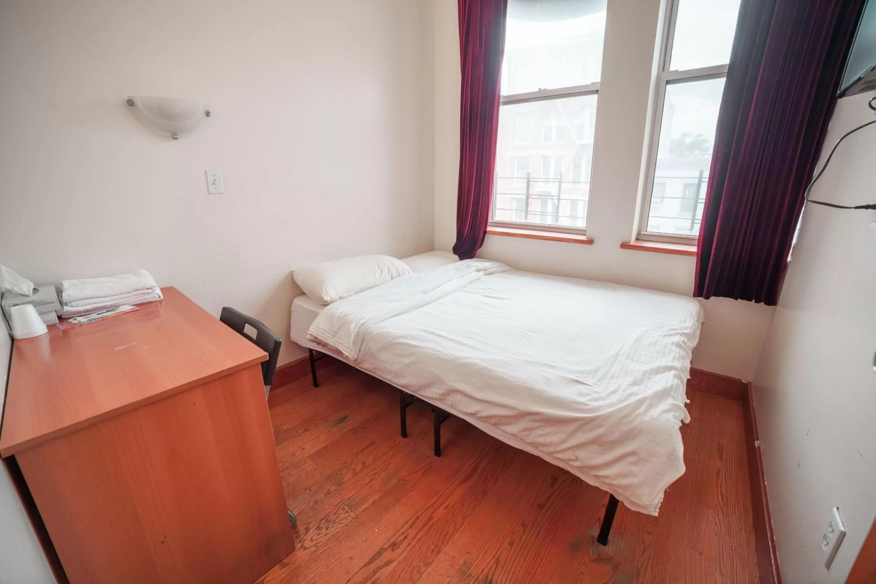 Bed in U.S. Pacific Hotel