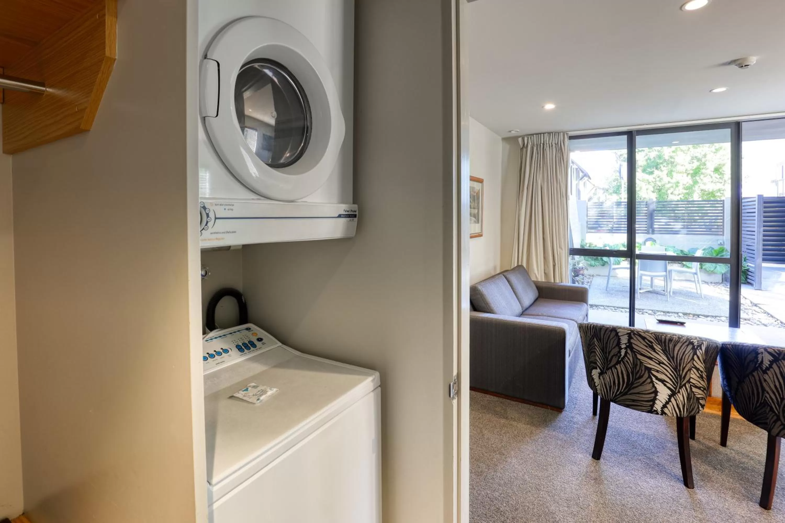 washing machine in Garden Court Suites & Apartments