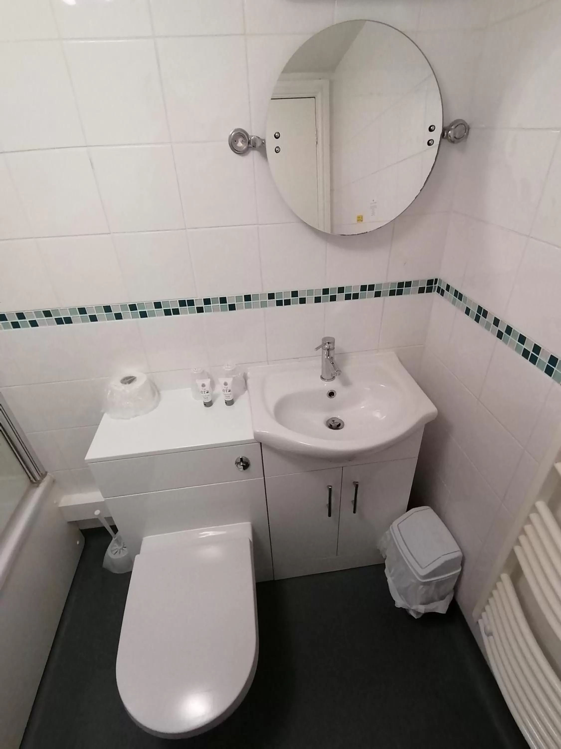 Toilet in North Shore Hotel