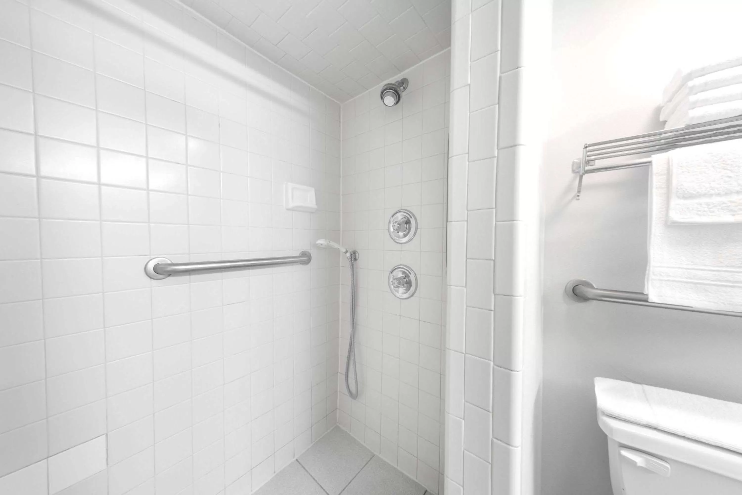 Bathroom in Super 8 by Wyndham Adel GA I-75