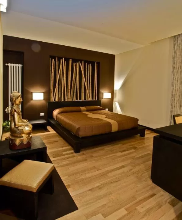 Photo of the whole room, Bed in Design Suite Tirano