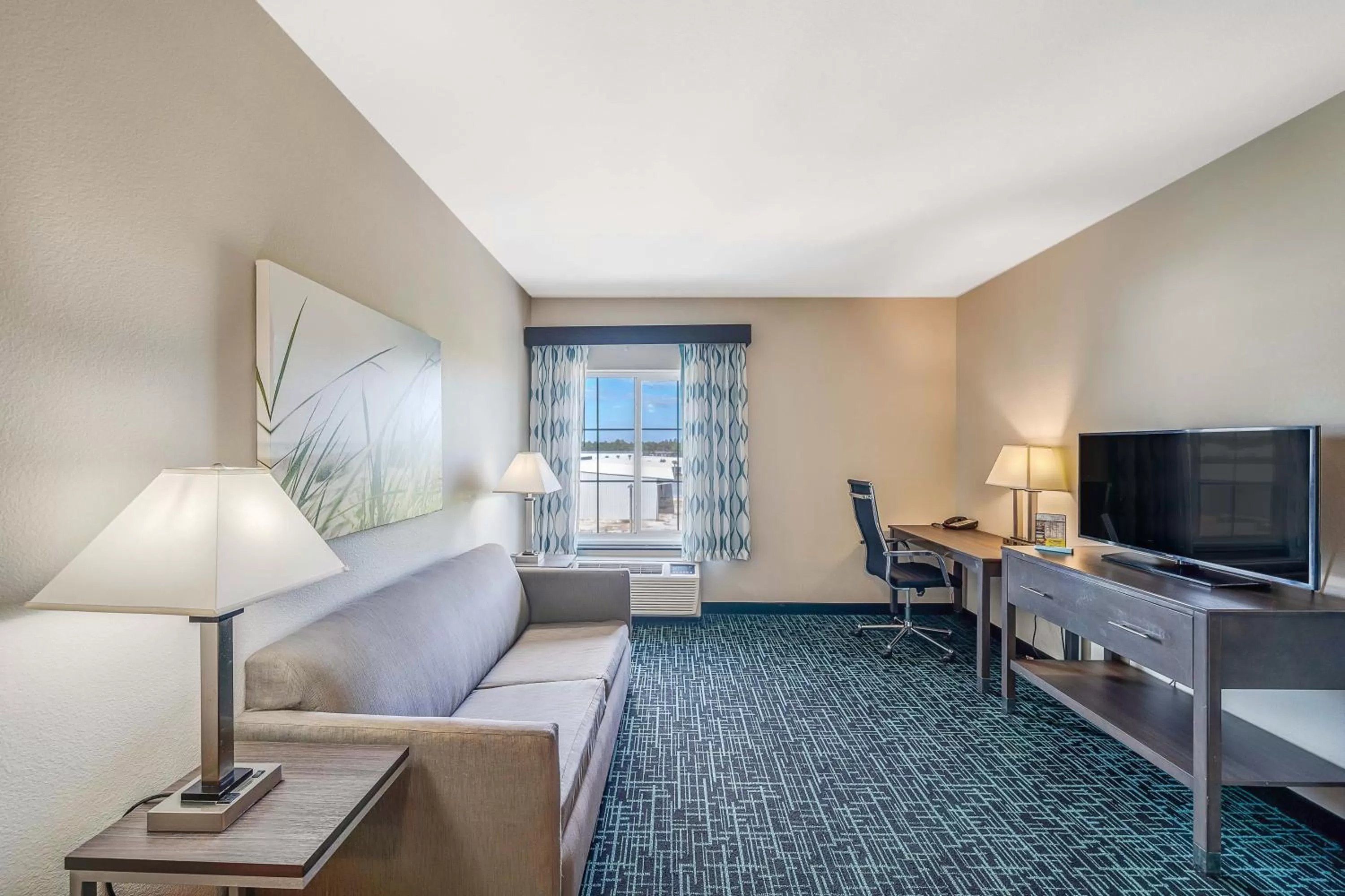 Living room in La Quinta by Wyndham PCB Pier Park area